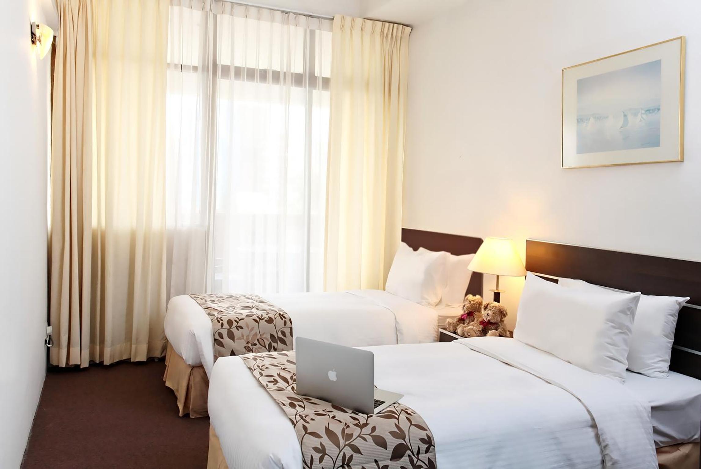 Deluxe Two-Bedroom Suite (4 Persons) photo 2