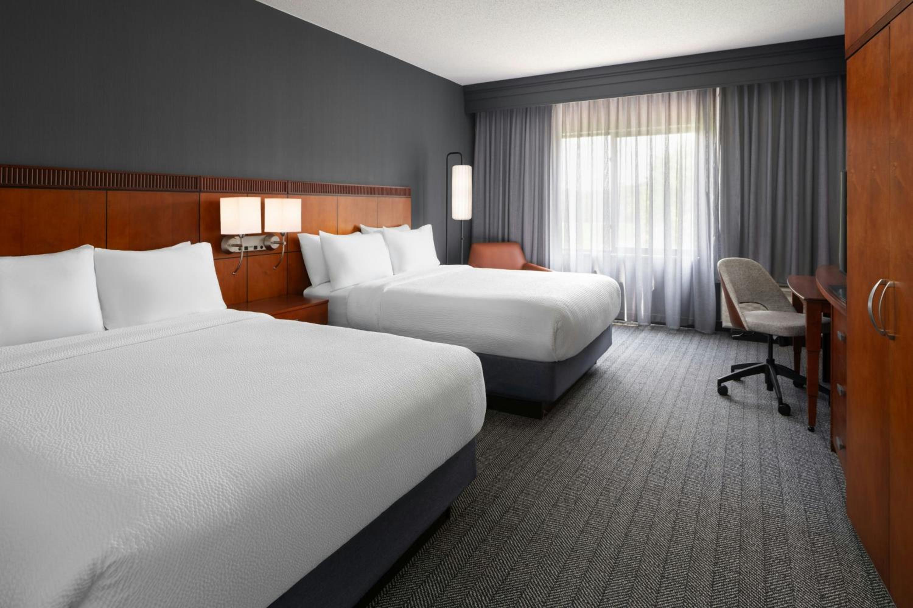 Queen Room with Two Queen Beds - Hearing Accessible - Photo 1
