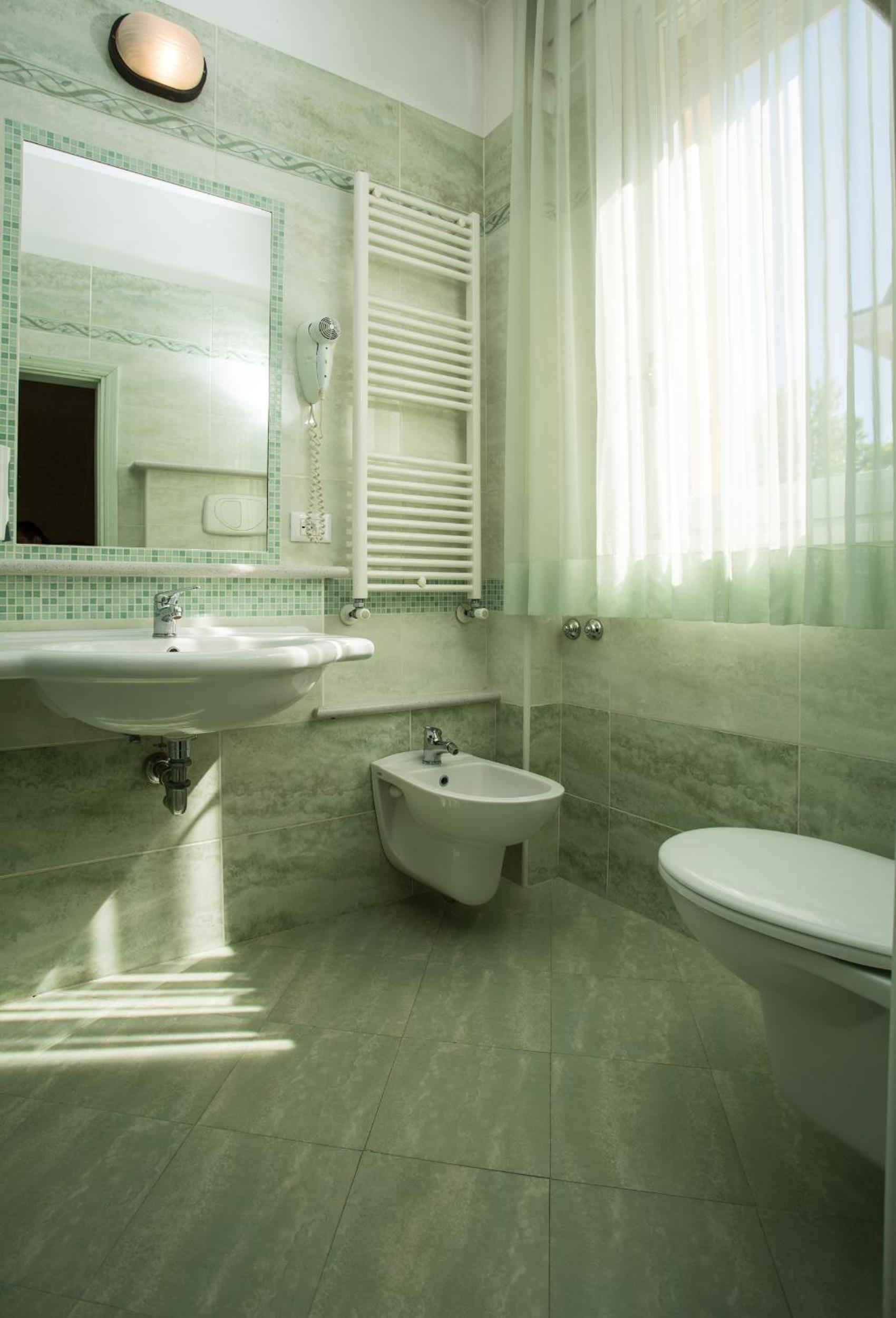 Quadruple Room with Balcony photo 2
