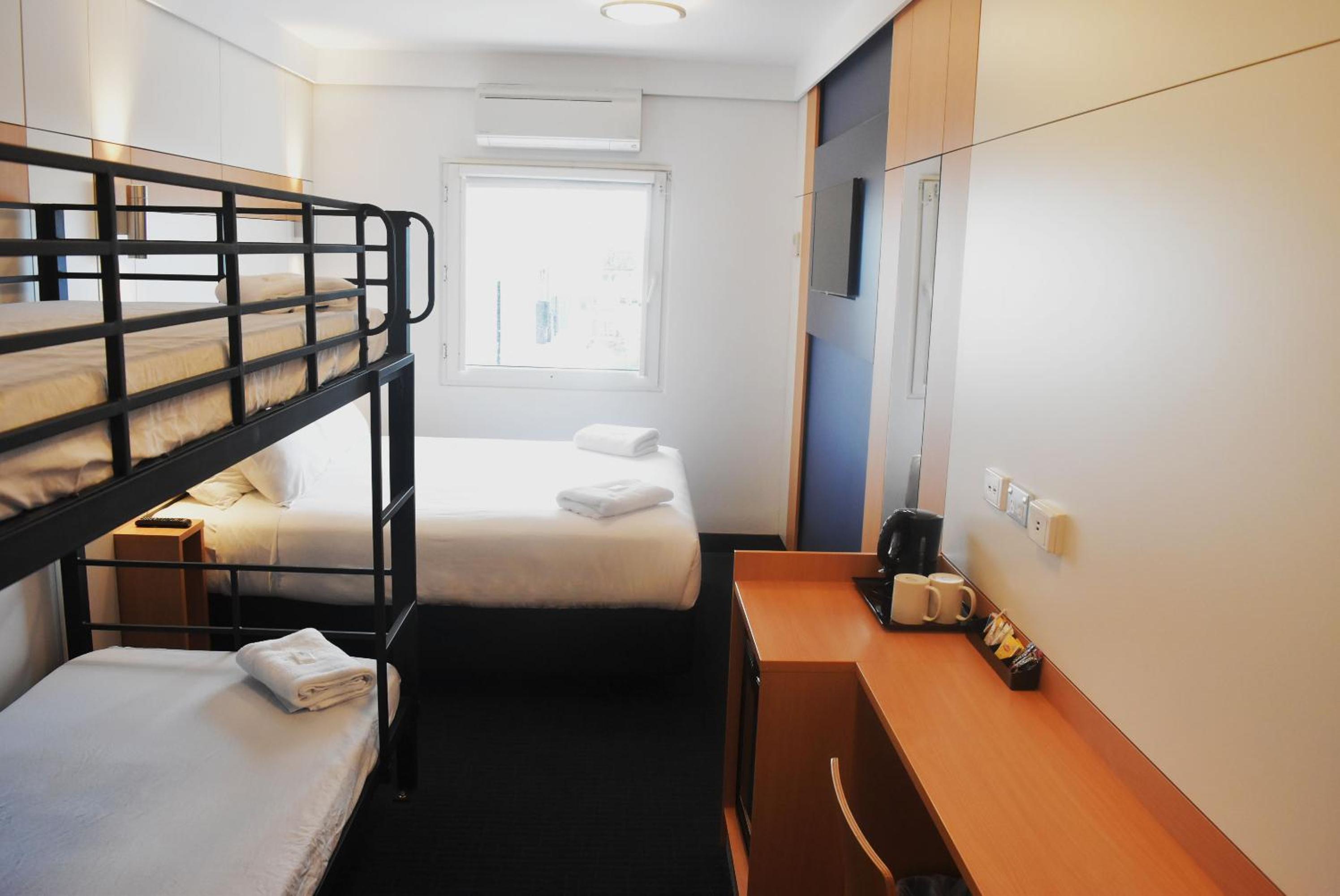Standard Family Room with One Queen and Double Deck Bunk Beds