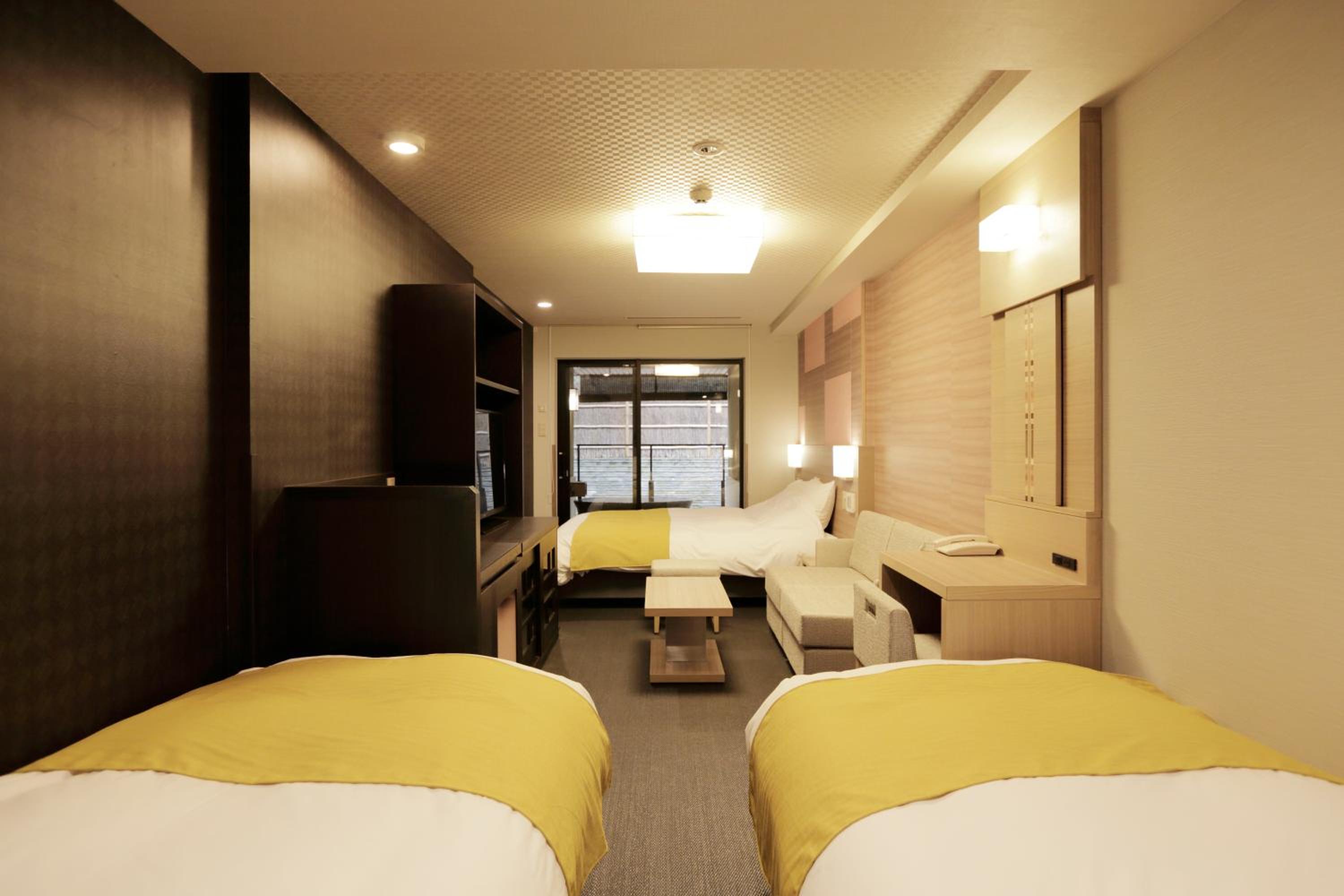 Standard Triple Room with Open-Air Bath - Photo 1