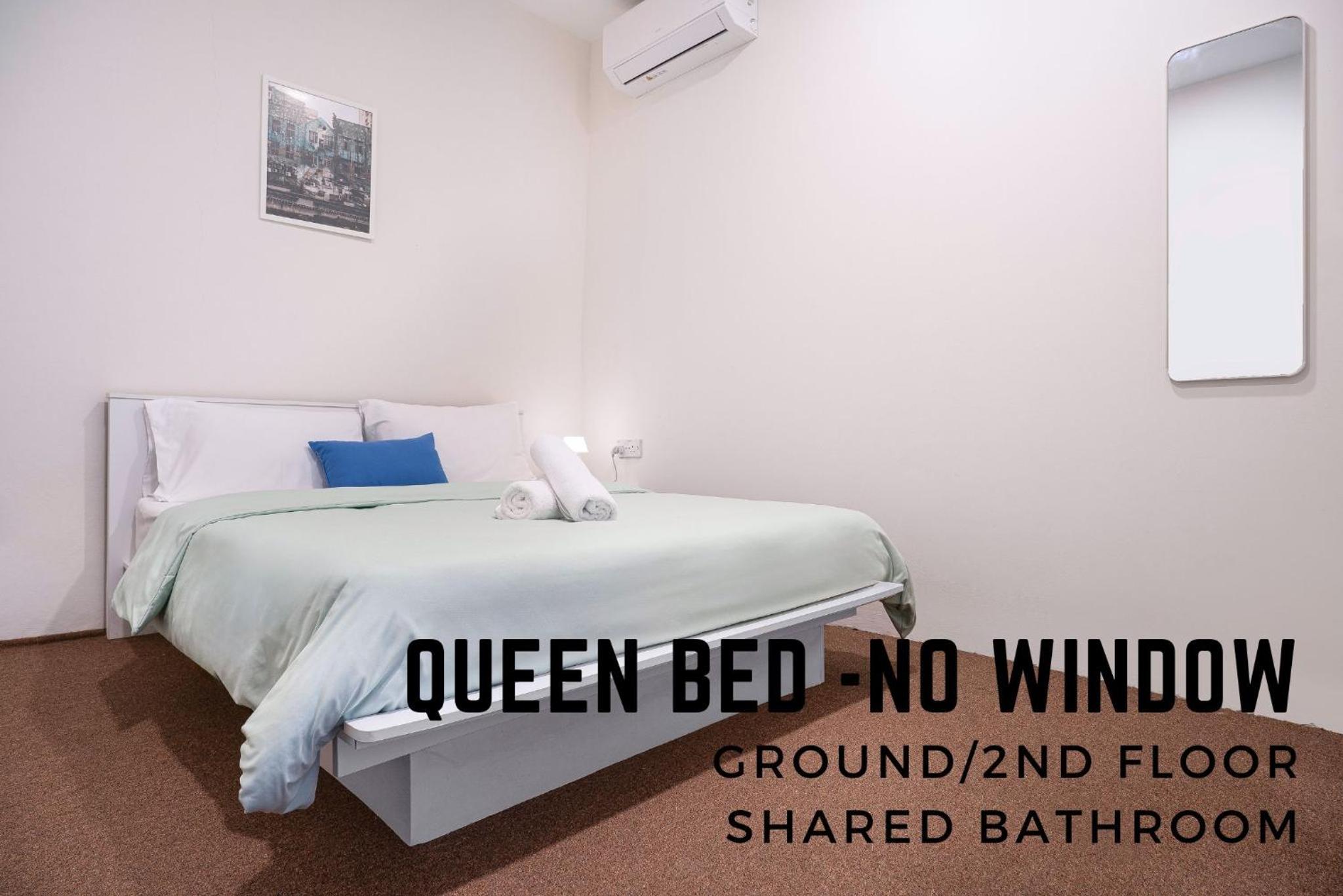 Queen Room with Shared Bathroom