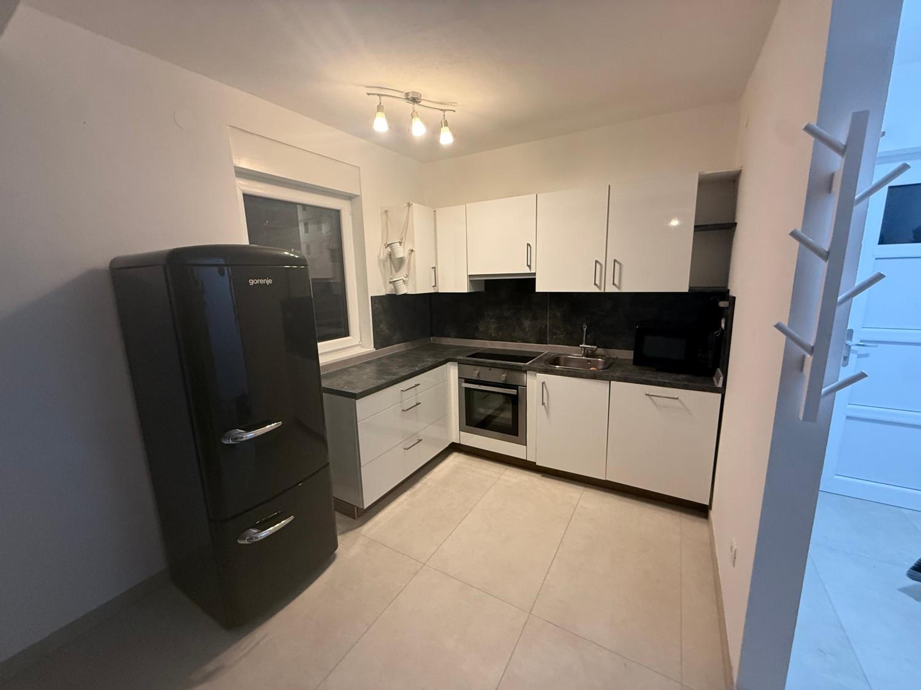 Two-Bedroom Apartment with Balcony