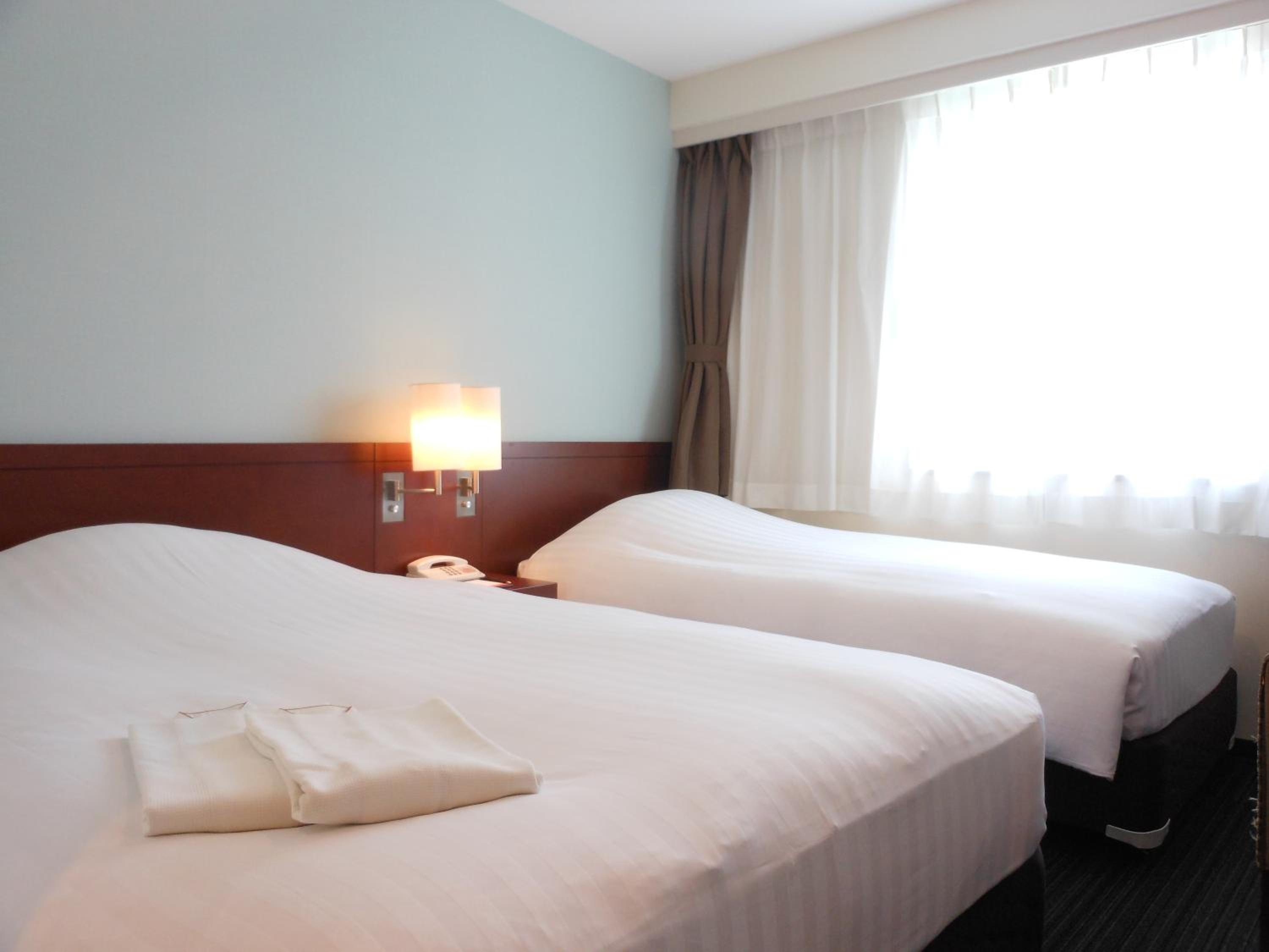Twin Room - Non-Smoking - Photo 1