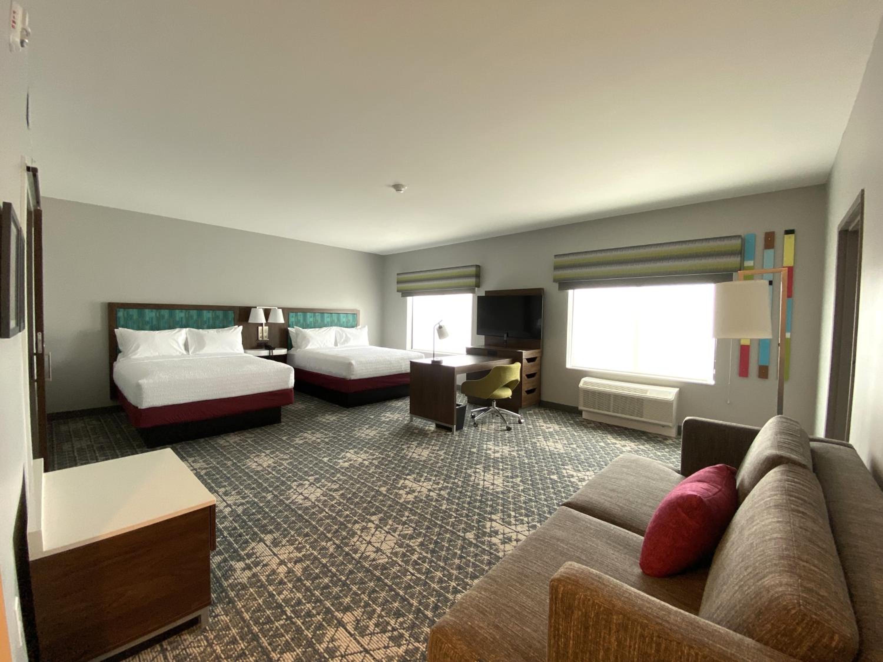 Two Room Suite with One King and Two Queen Beds - Photo 1