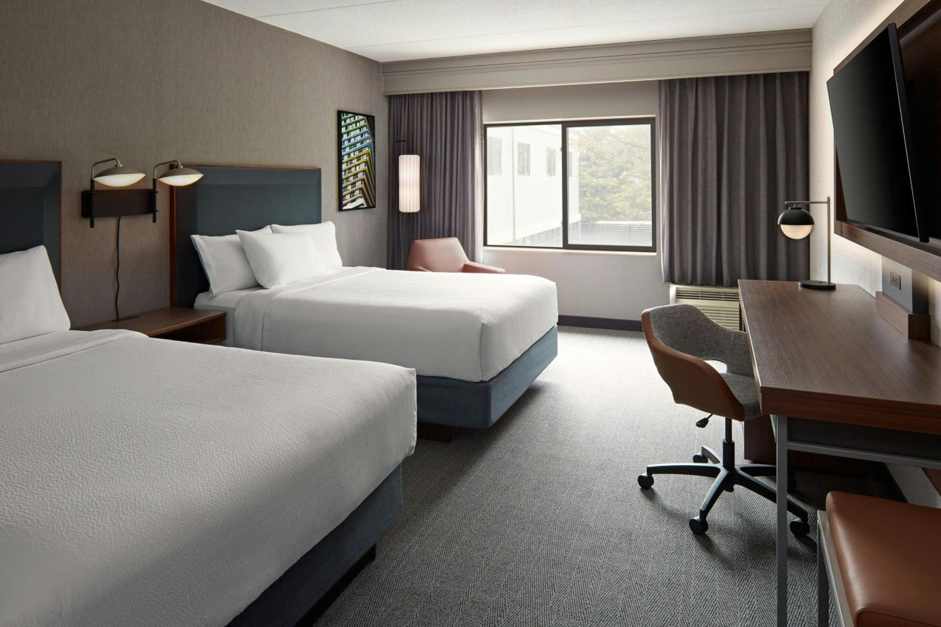 Queen Room with Two Queen Beds and Sofa Bed - Photo 2
