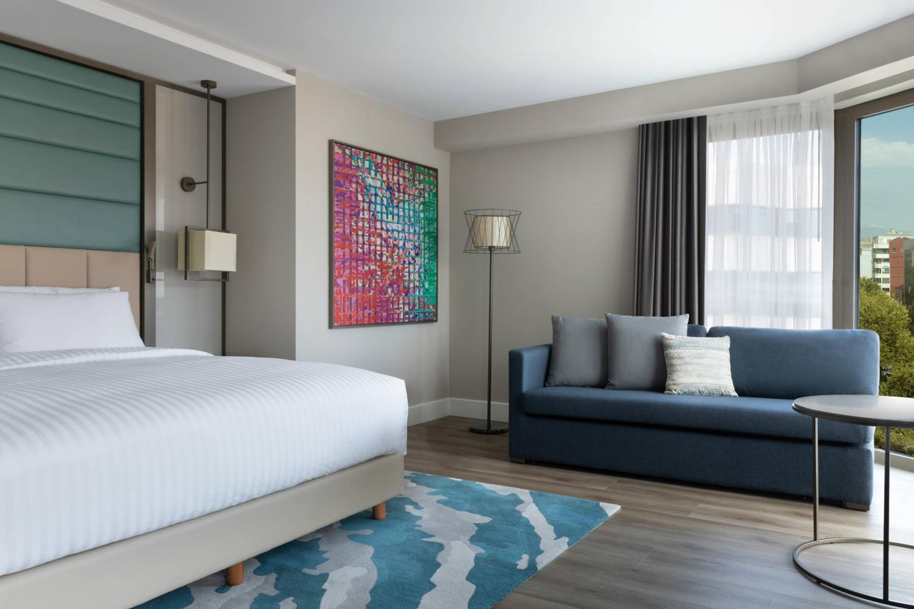 Family King Room with Sofa Bed, Partial Sea View and Corner Room