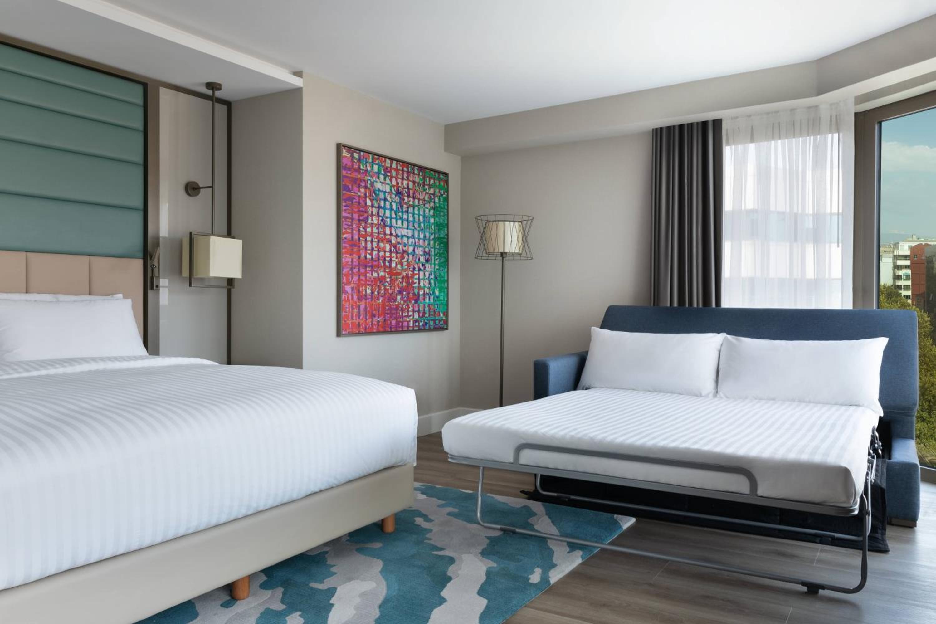 Family King Room with Sofa Bed, Partial Sea View and Corner Room