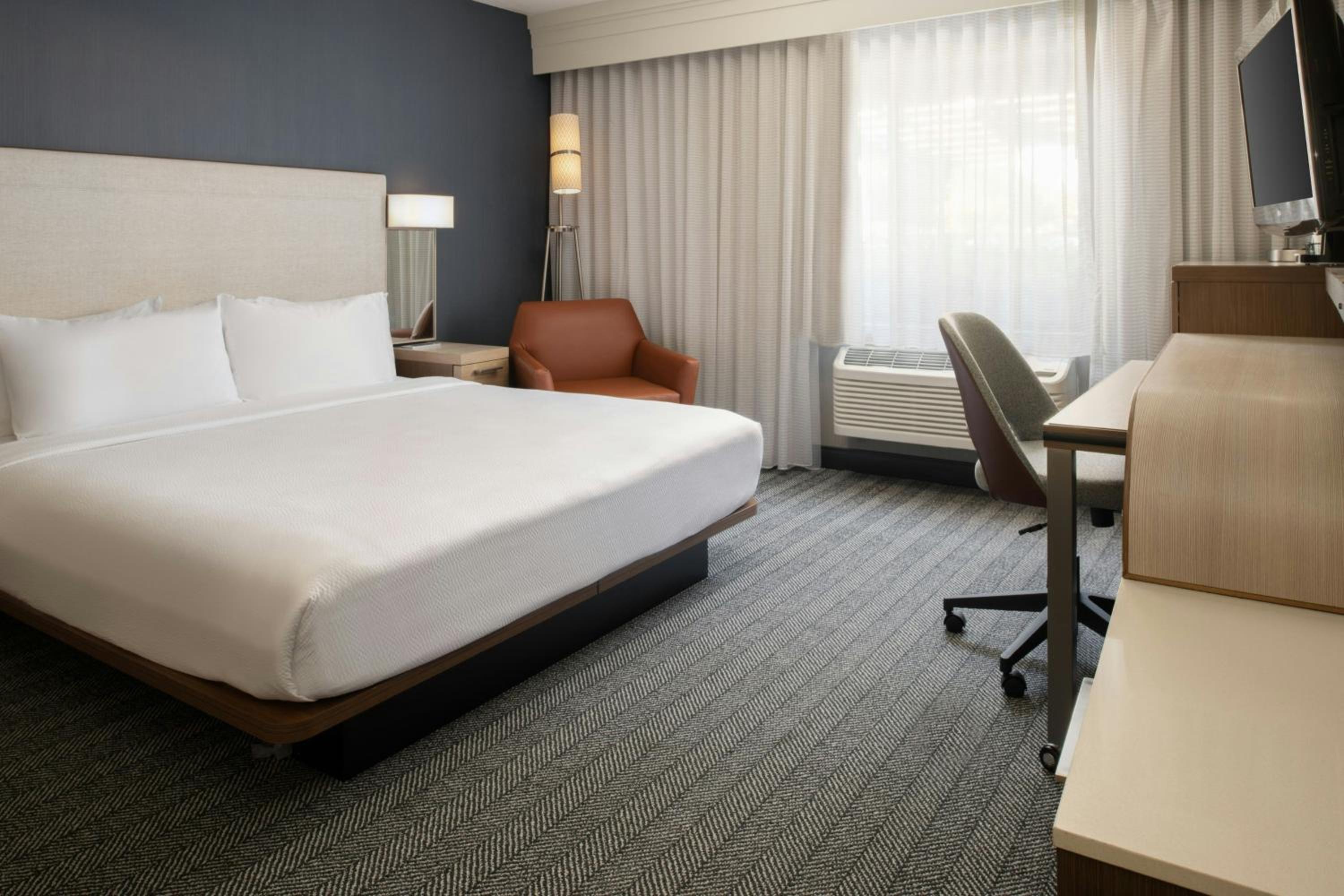 King Room with Sofa Bed and Roll-in Shower - Mobility and Hearing Accessible - Photo 1
