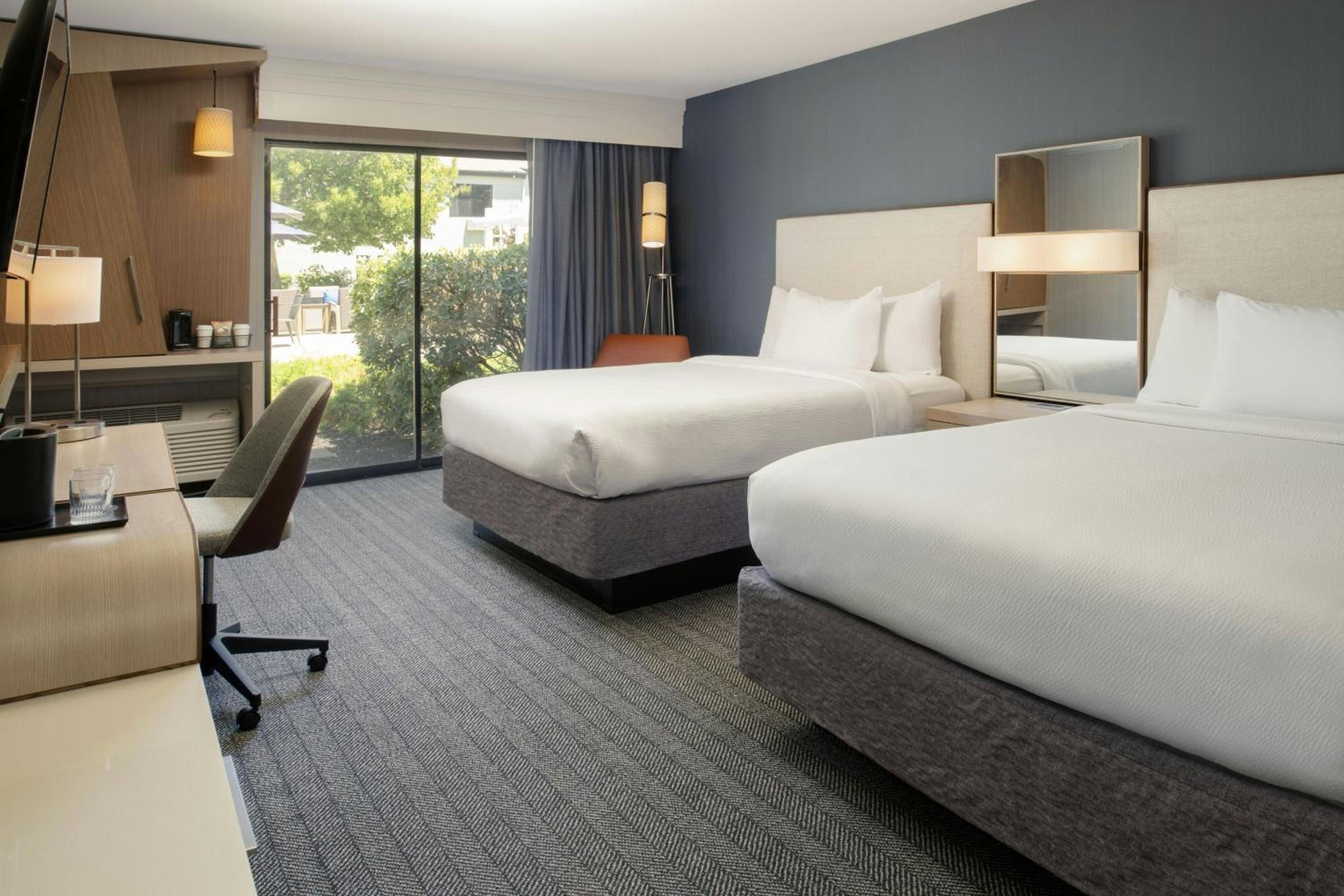 Queen Room with Two Queen Beds and Roll-in Shower - Mobility and Hearing Accessible - Photo 1