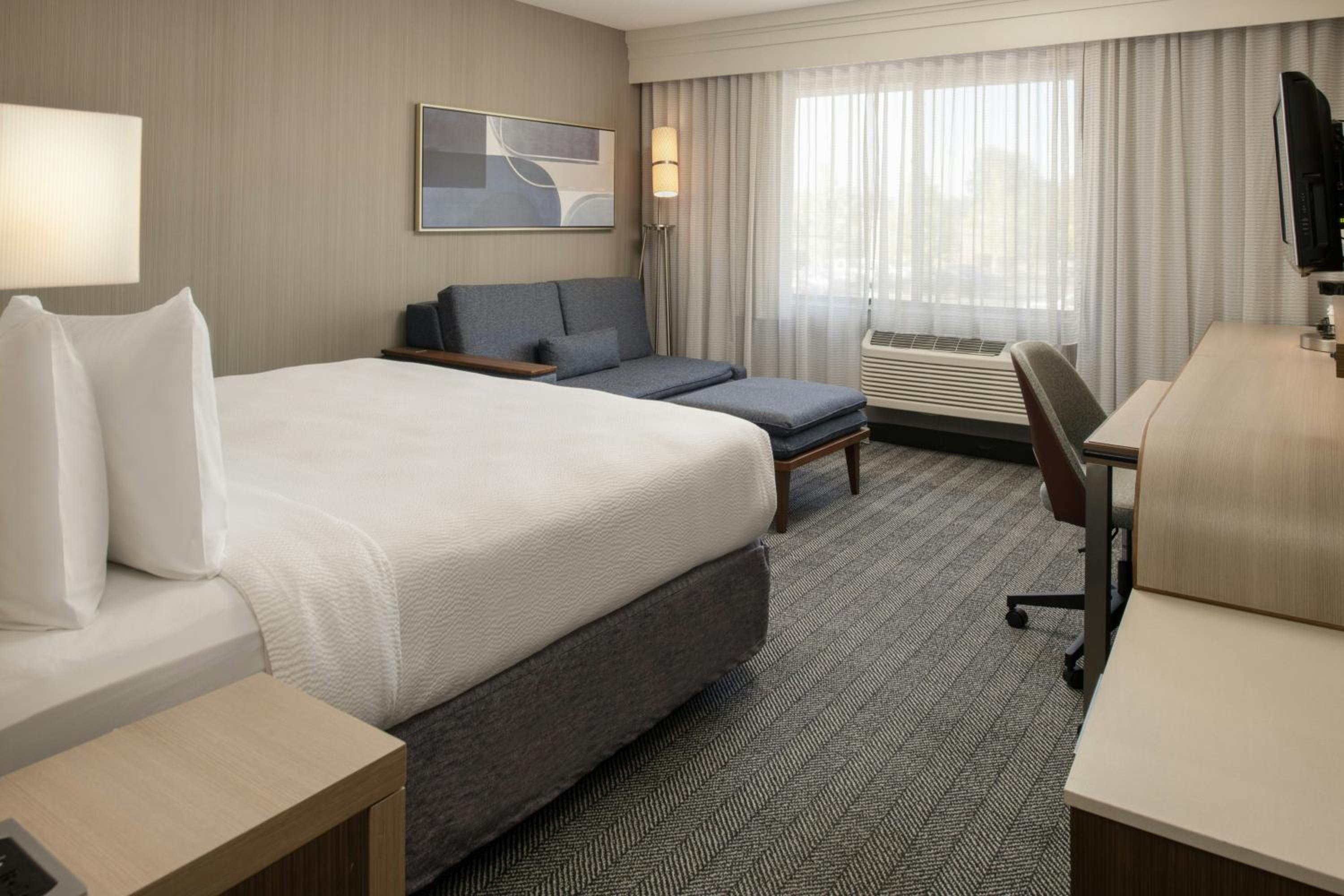 King Room with Sofa Bed and Roll-in Shower - Mobility and Hearing Accessible - Photo 4