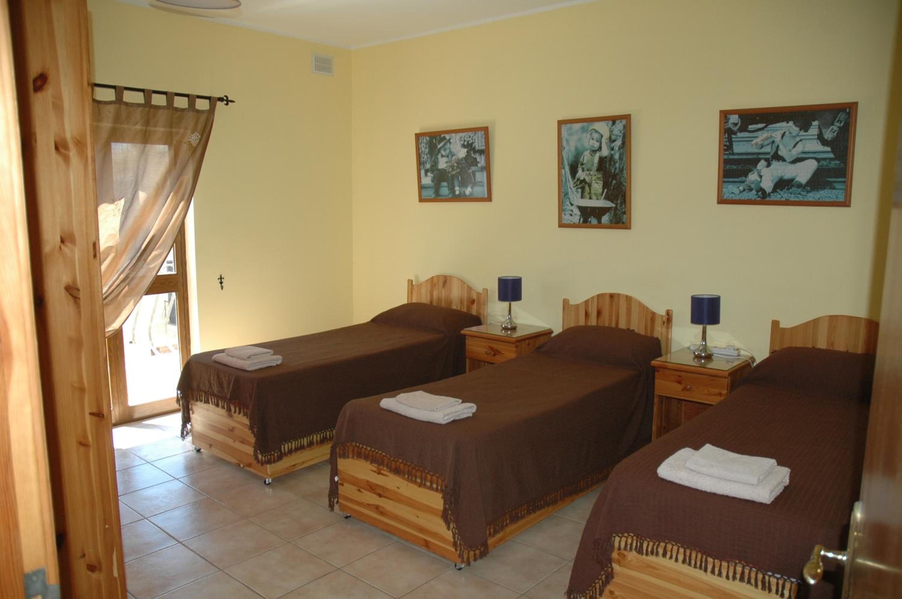 Triple Room with Shared Bathroom