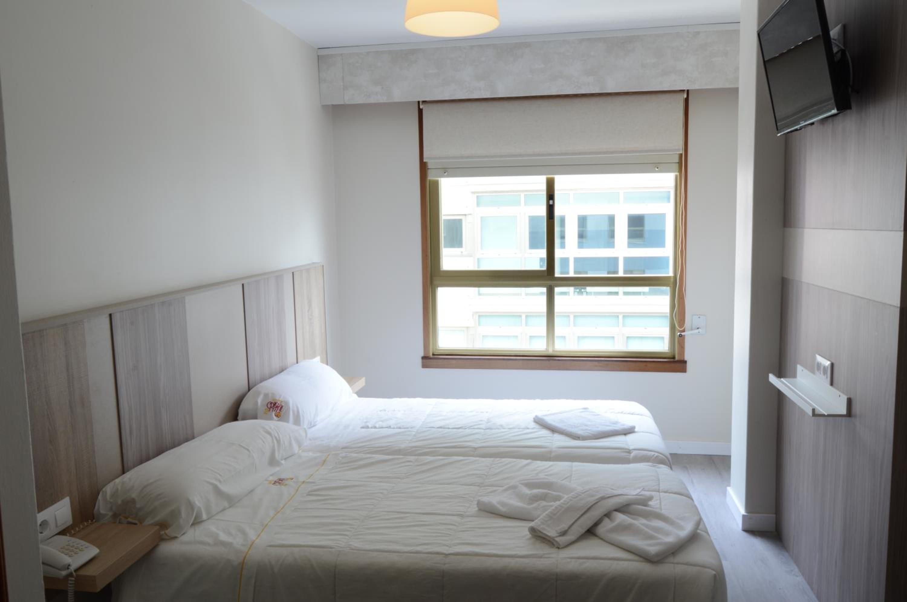 Twin Room - Photo 1