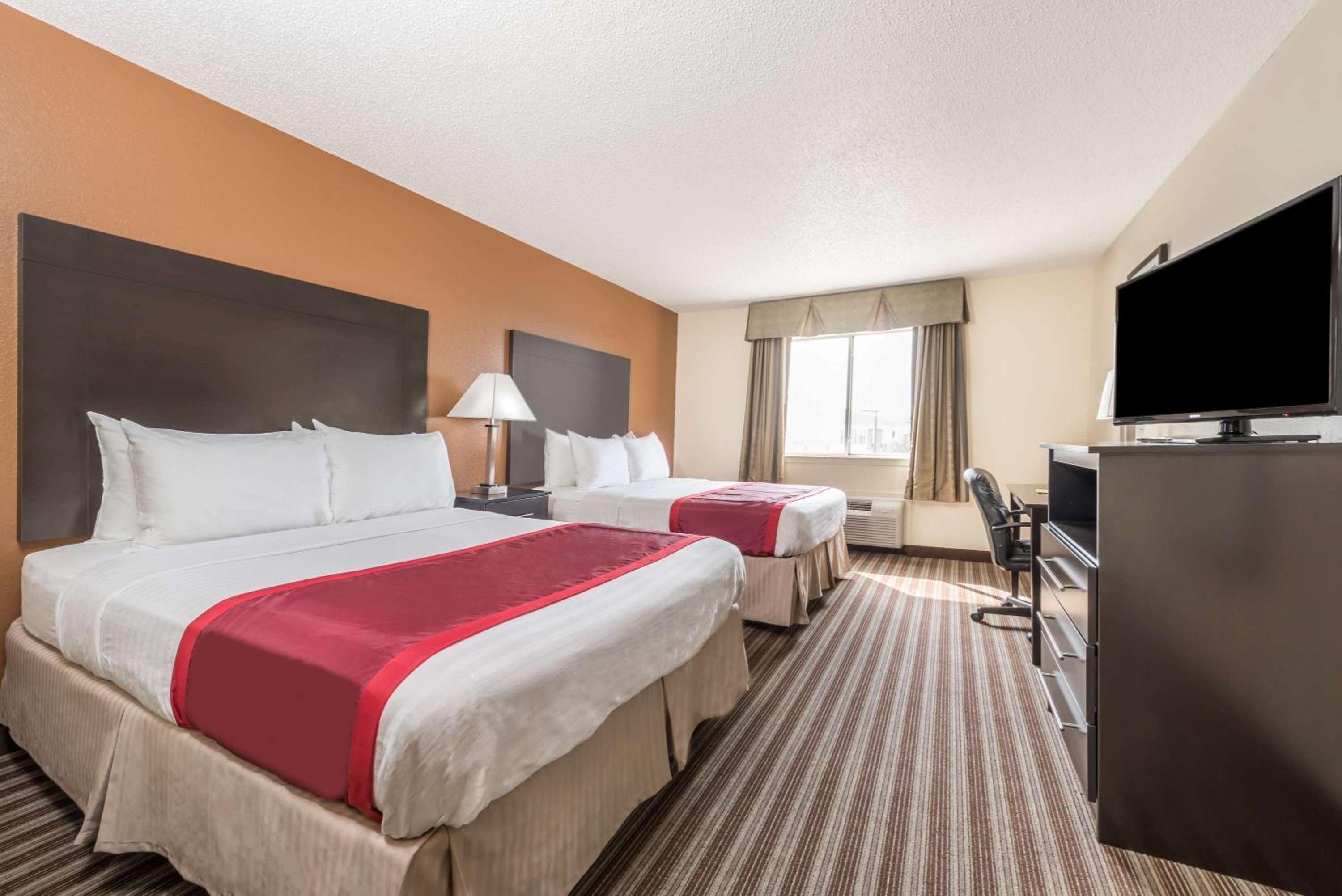 Queen Room with Two Queen Beds - Photo 1