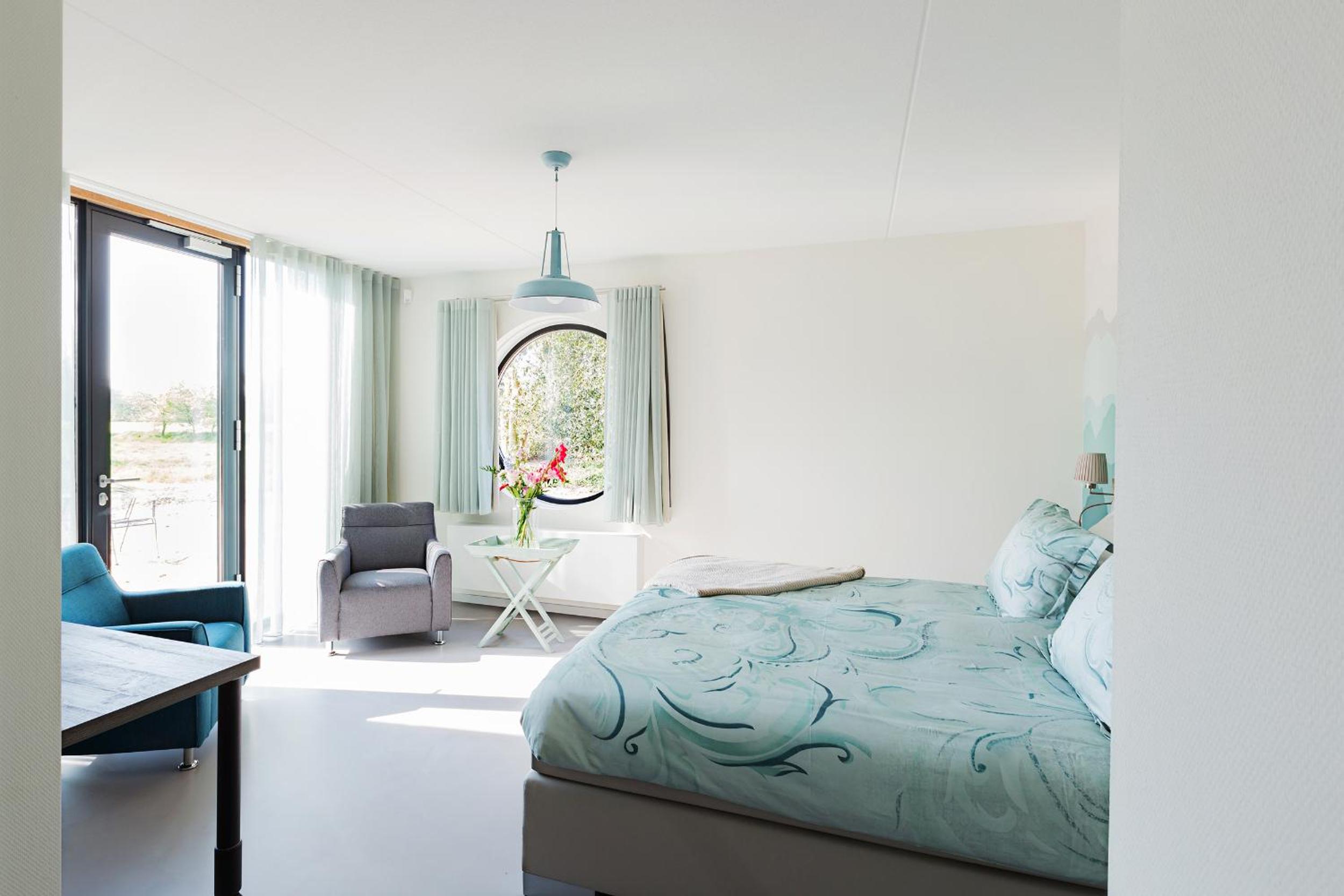 Deluxe Queen Room with Two Queen Beds - Photo 1