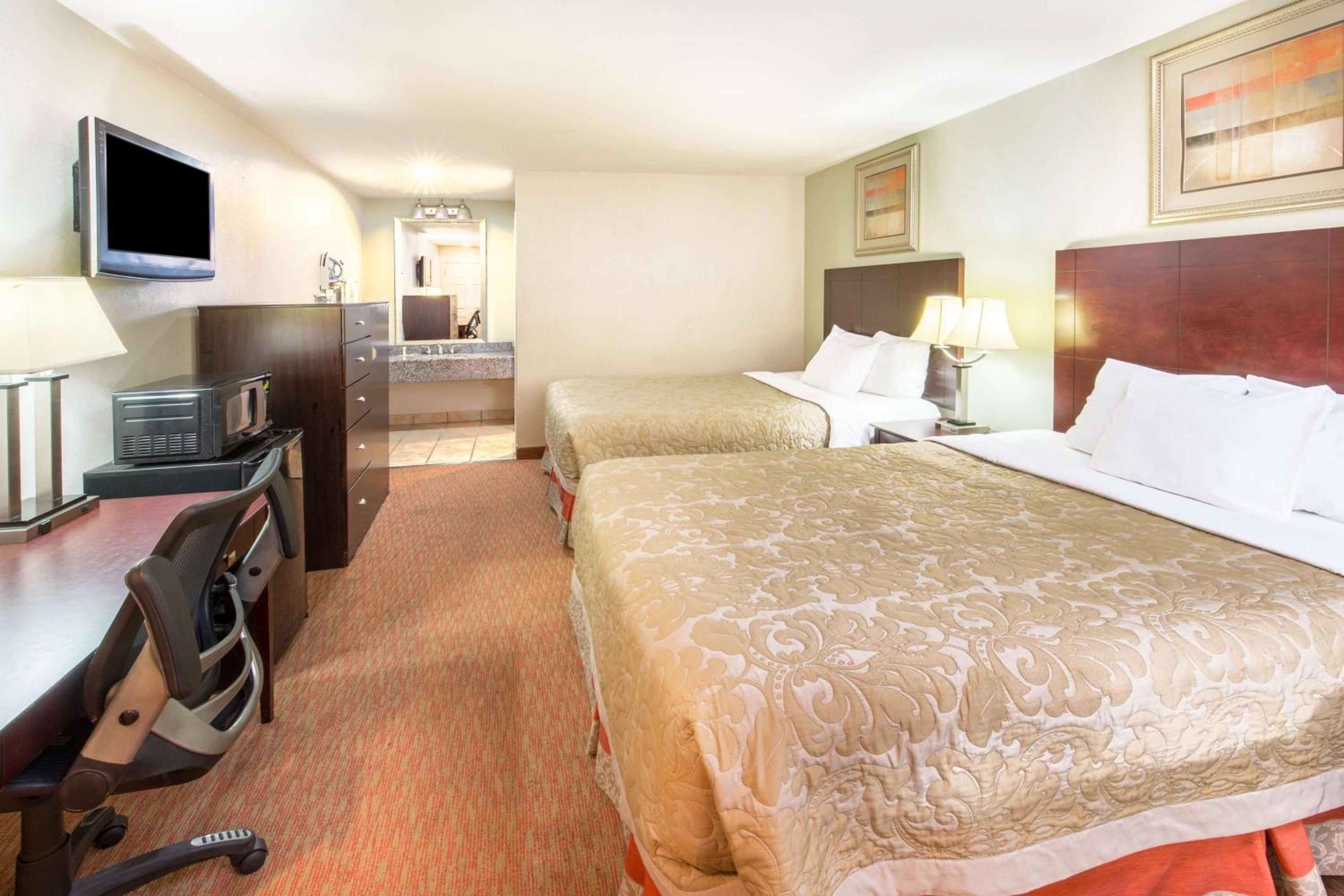 Queen Room with Two Queen Beds - Photo 1