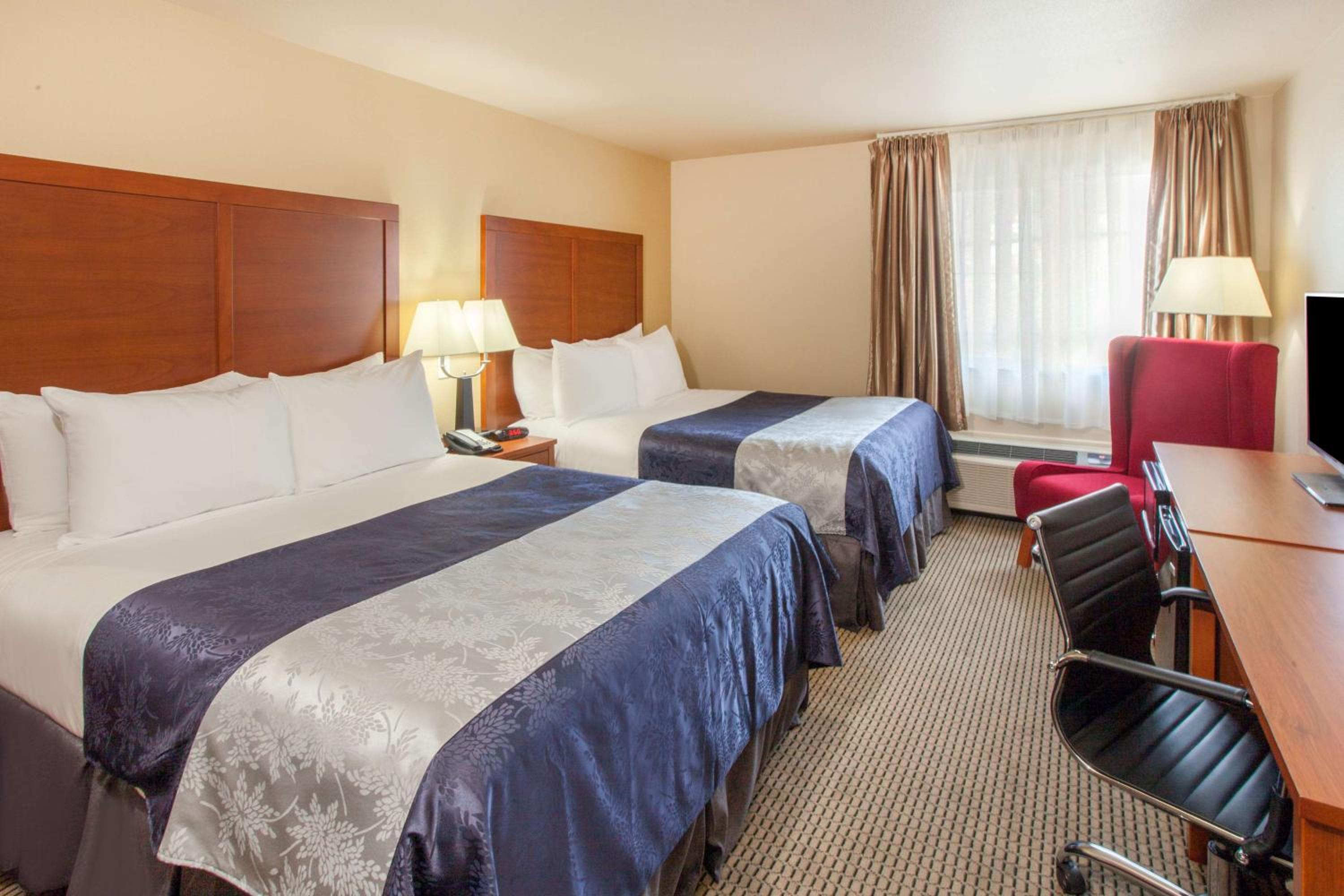 Queen Room with Two Queen Beds and Bath Tub with Grab Bars - Mobility Accessible - Non-Smoking photo 1