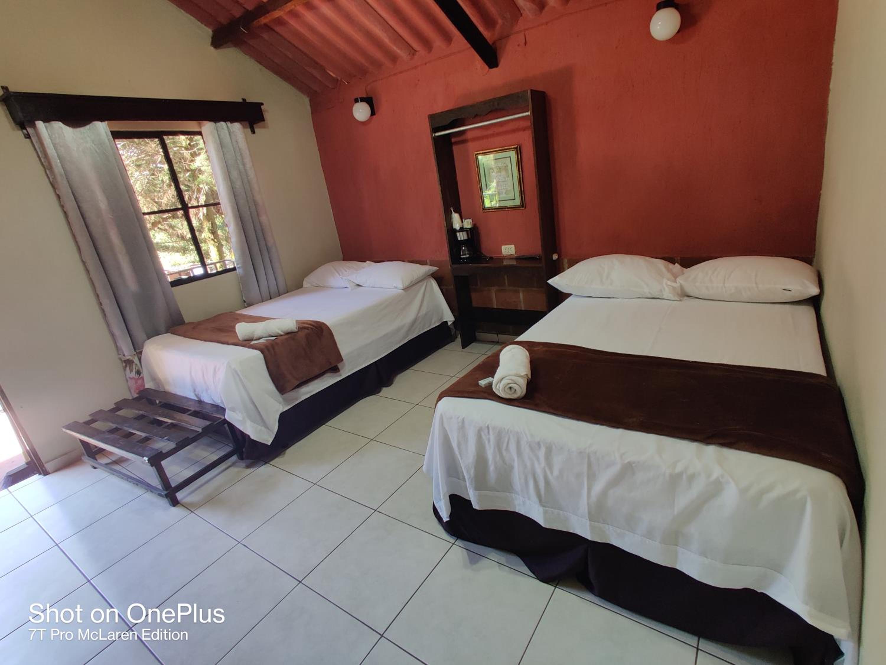 Standard Queen Room with Two Queen Beds photo 1