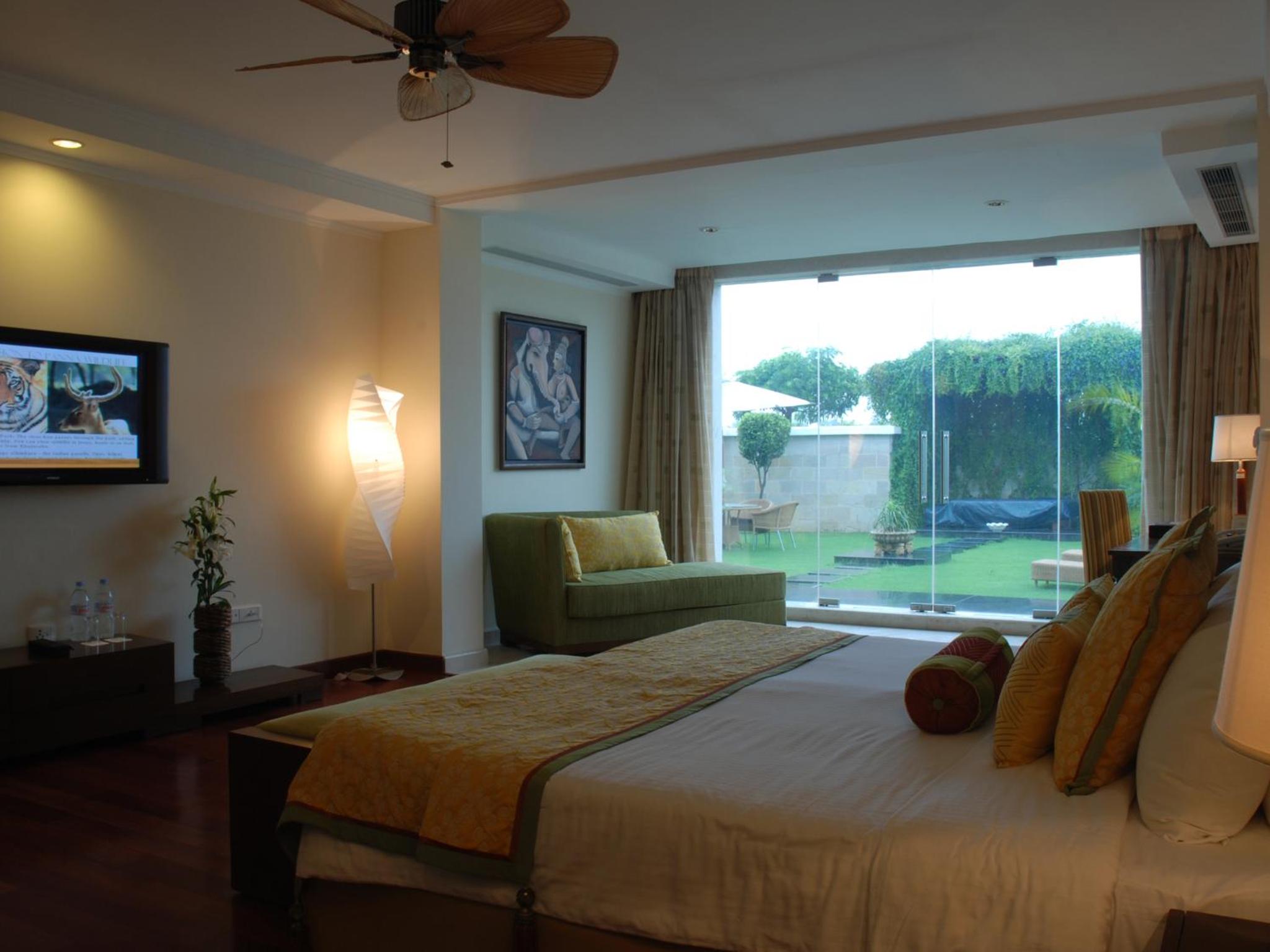 Lalit Garden view King Bed (Complimentary Welcome Drink on arrival,15% off on session of couple's Spa,15% off on session of couple's Spa, 15% off on Food & Beverage services, 15% Off on Laundry service for upto 20 clothing item)