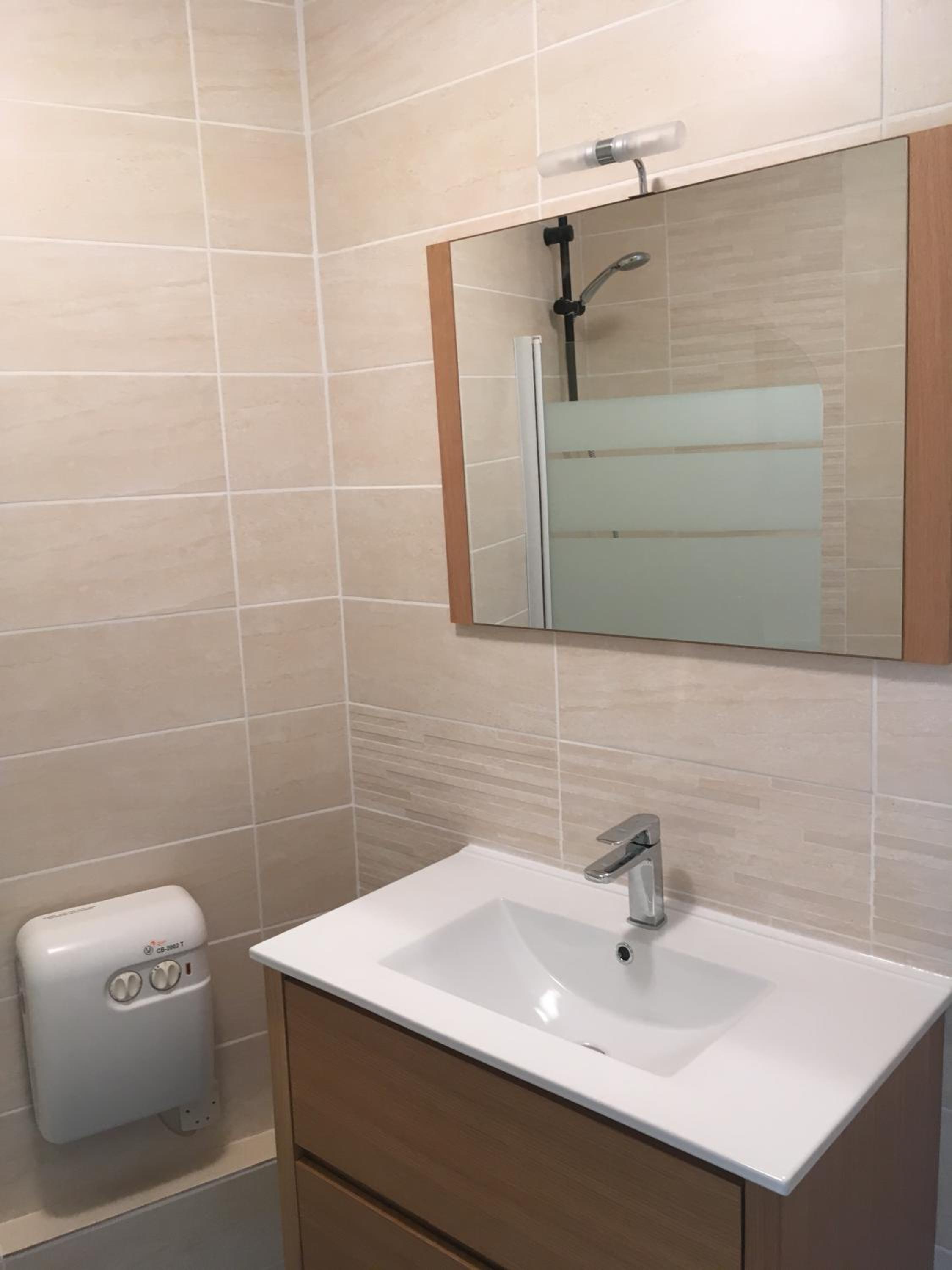 Studio Apartment with One King and One Single Bed, Balcony and Street View - Non-Smoking