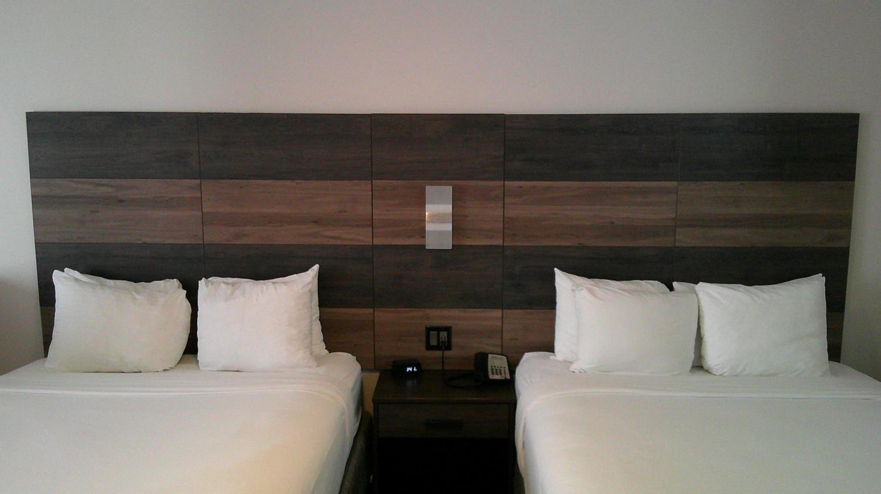 One-Bedroom Corner Suite with Two Queen Beds and Living Room - Non-Smoking - Photo 1