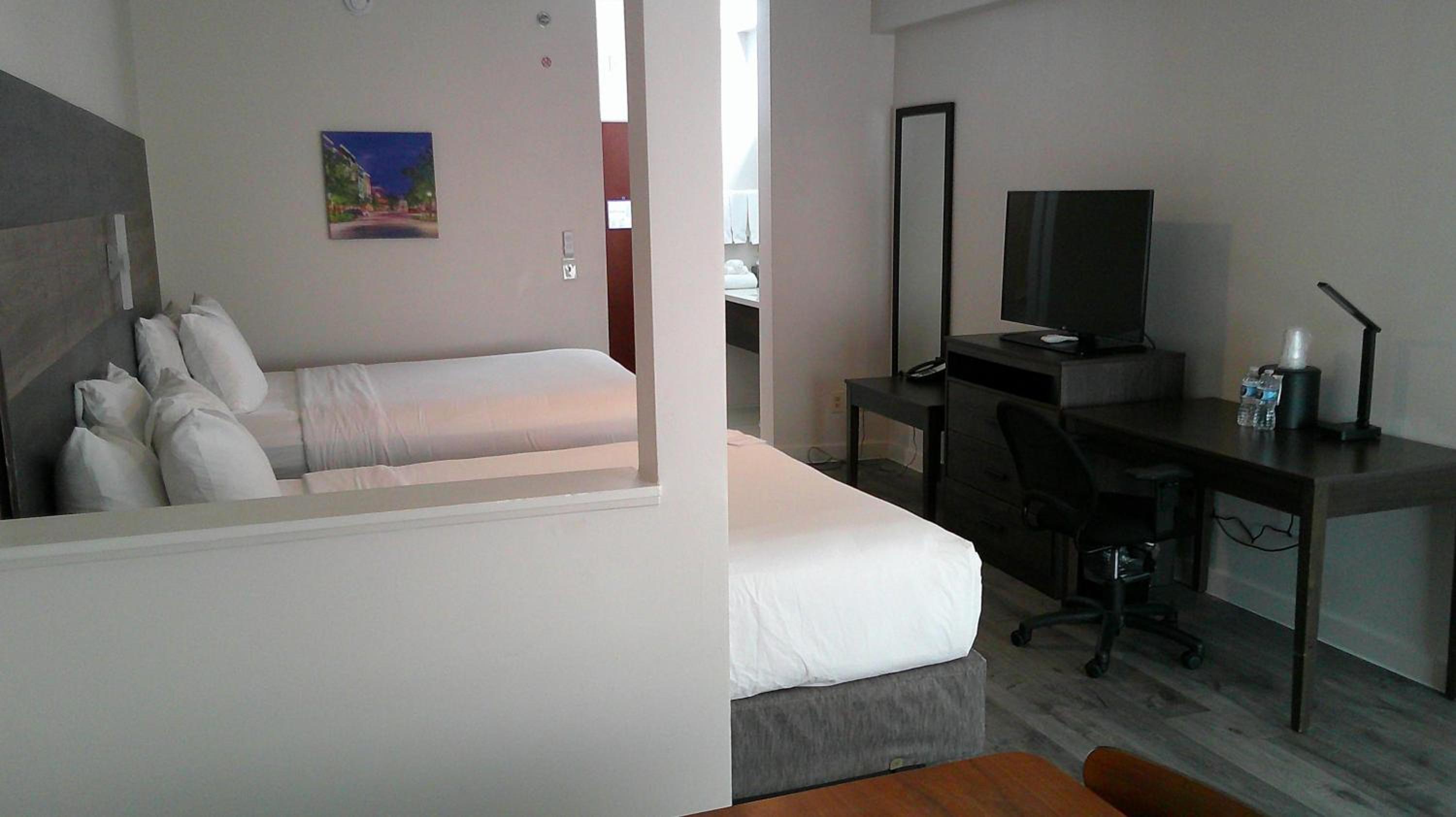 Larger Room with Two Queen Beds and Chair - Non-Smoking