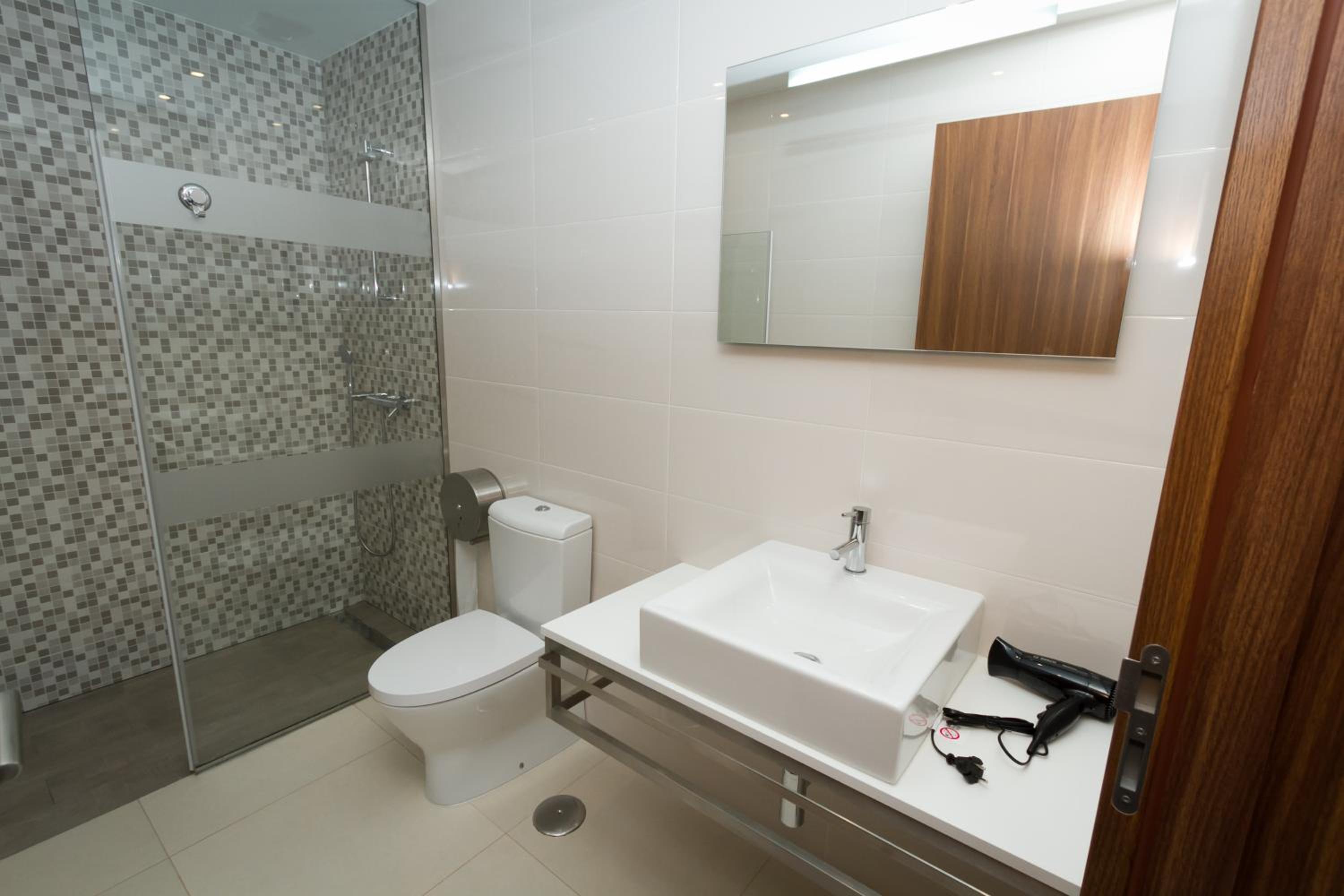 Three-Bedroom Apartment - Photo 2