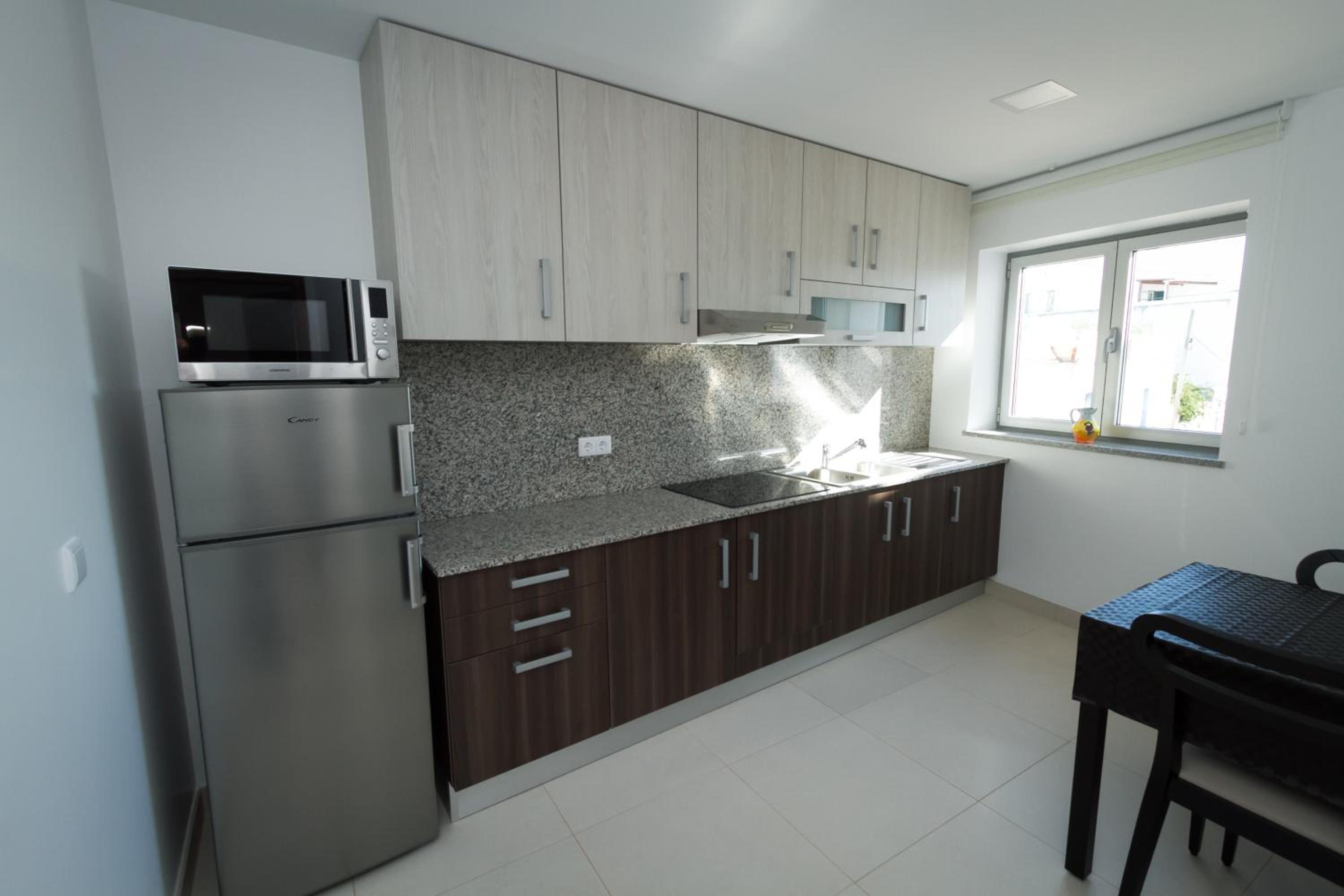 Three-Bedroom Apartment - Photo 6