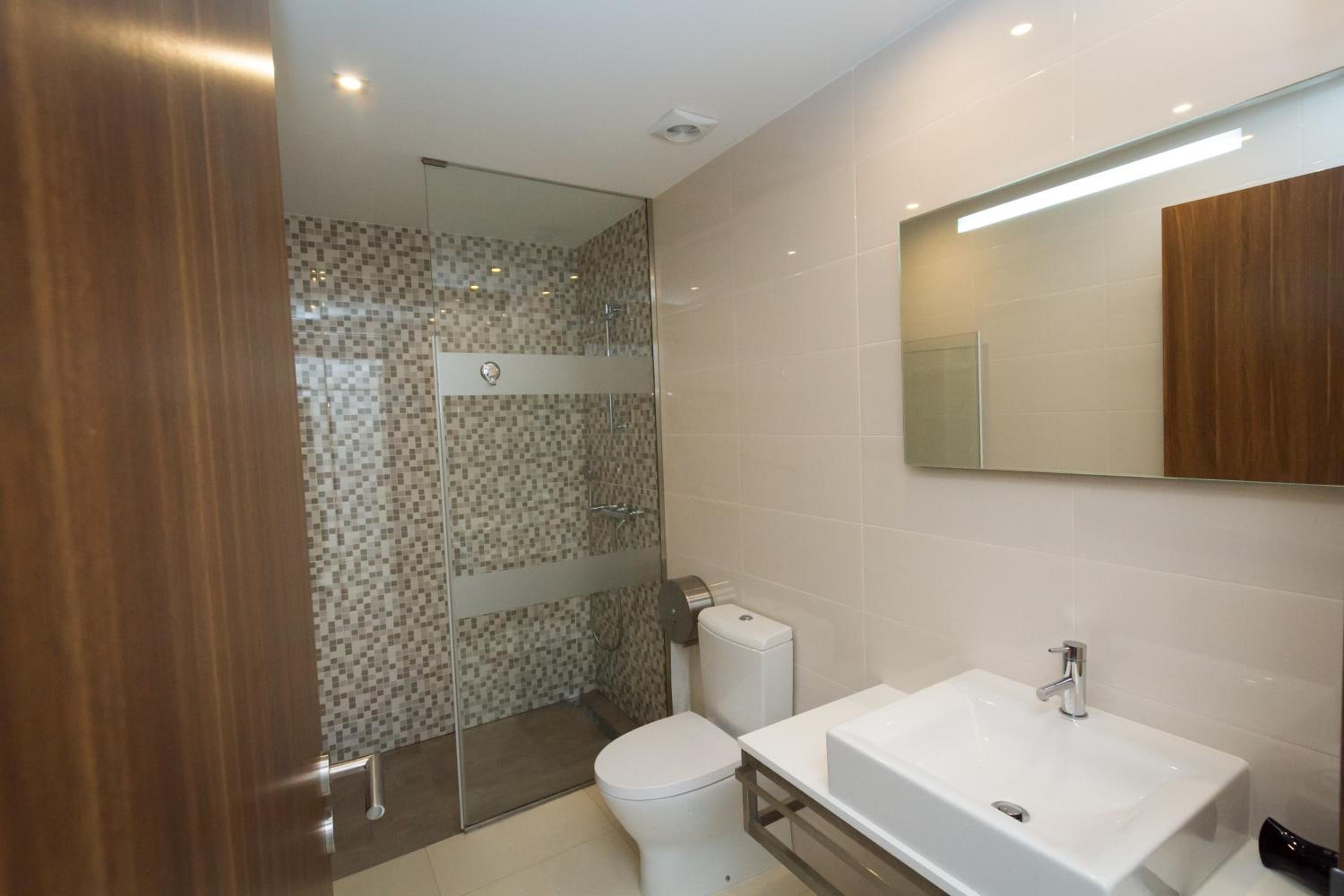 Three-Bedroom Apartment - Photo 9