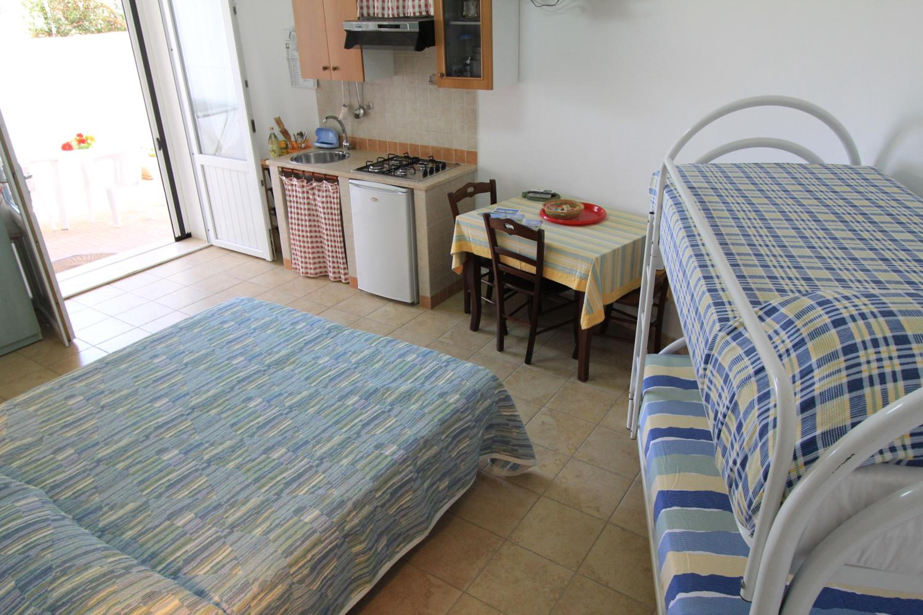 Quadruple Room with Private Bathroom photo 1