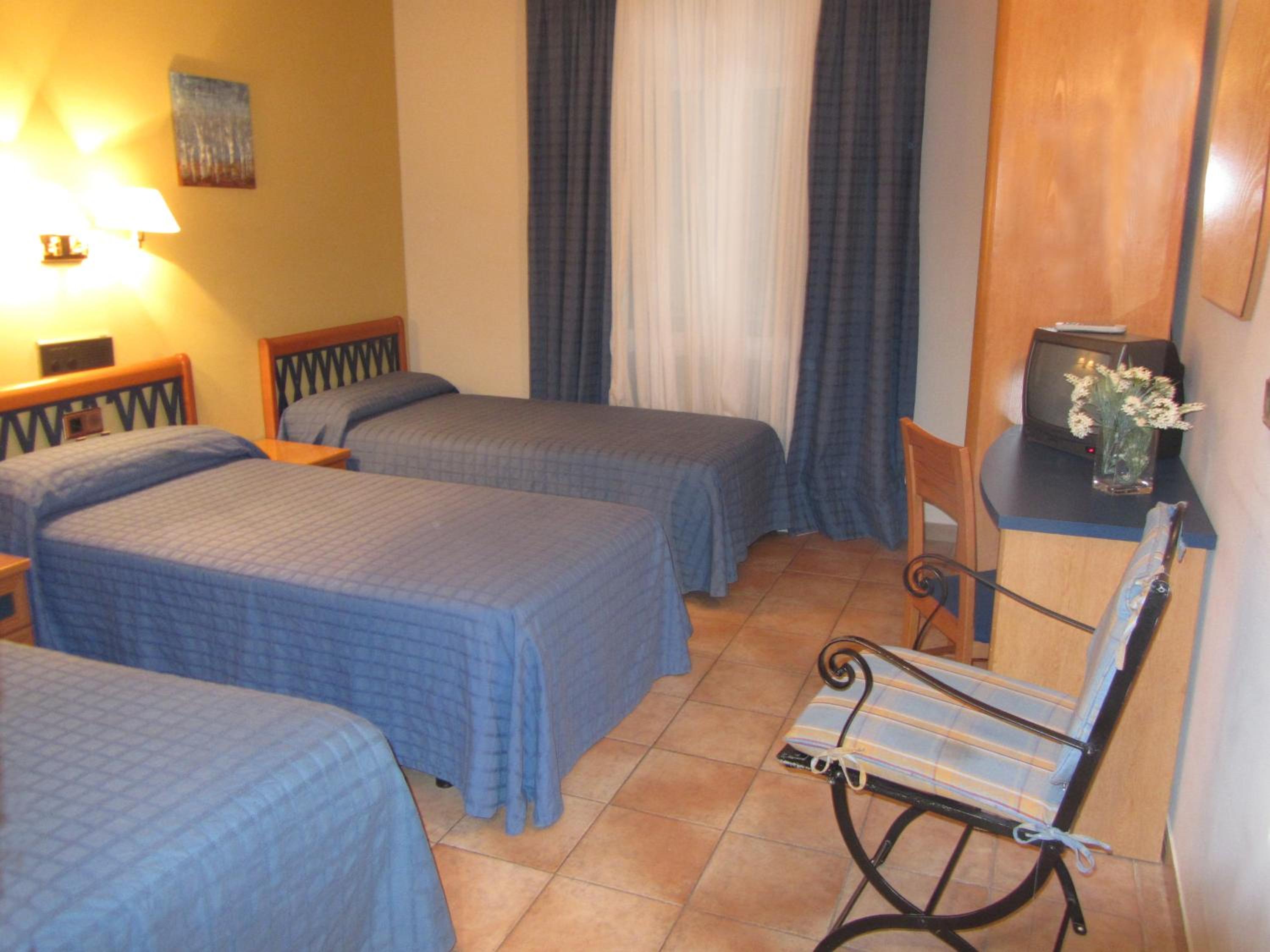 Triple Room - Photo 1