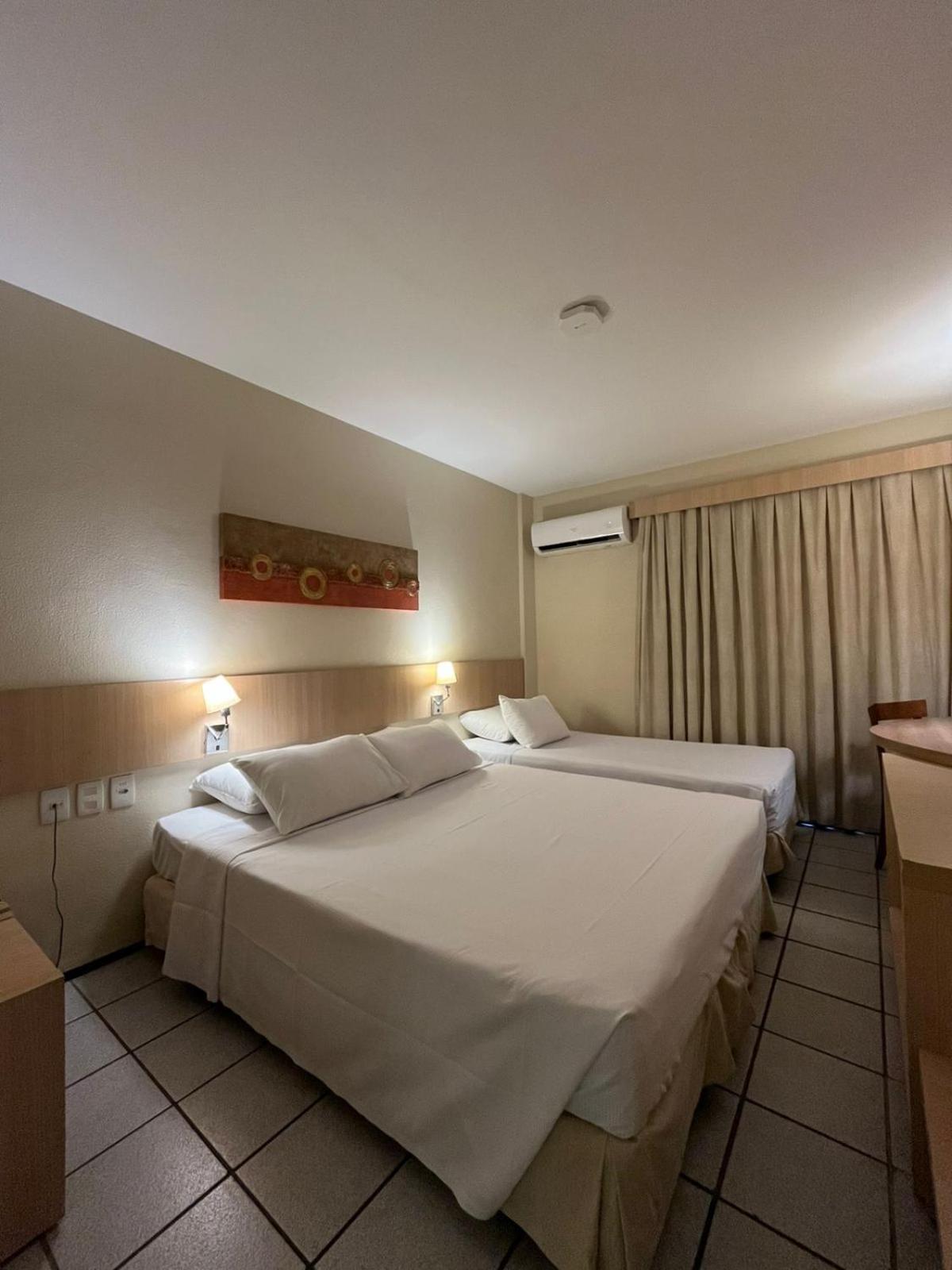 Deluxe Triple Room (double + single bed)  with parcial sea view  - Photo 1