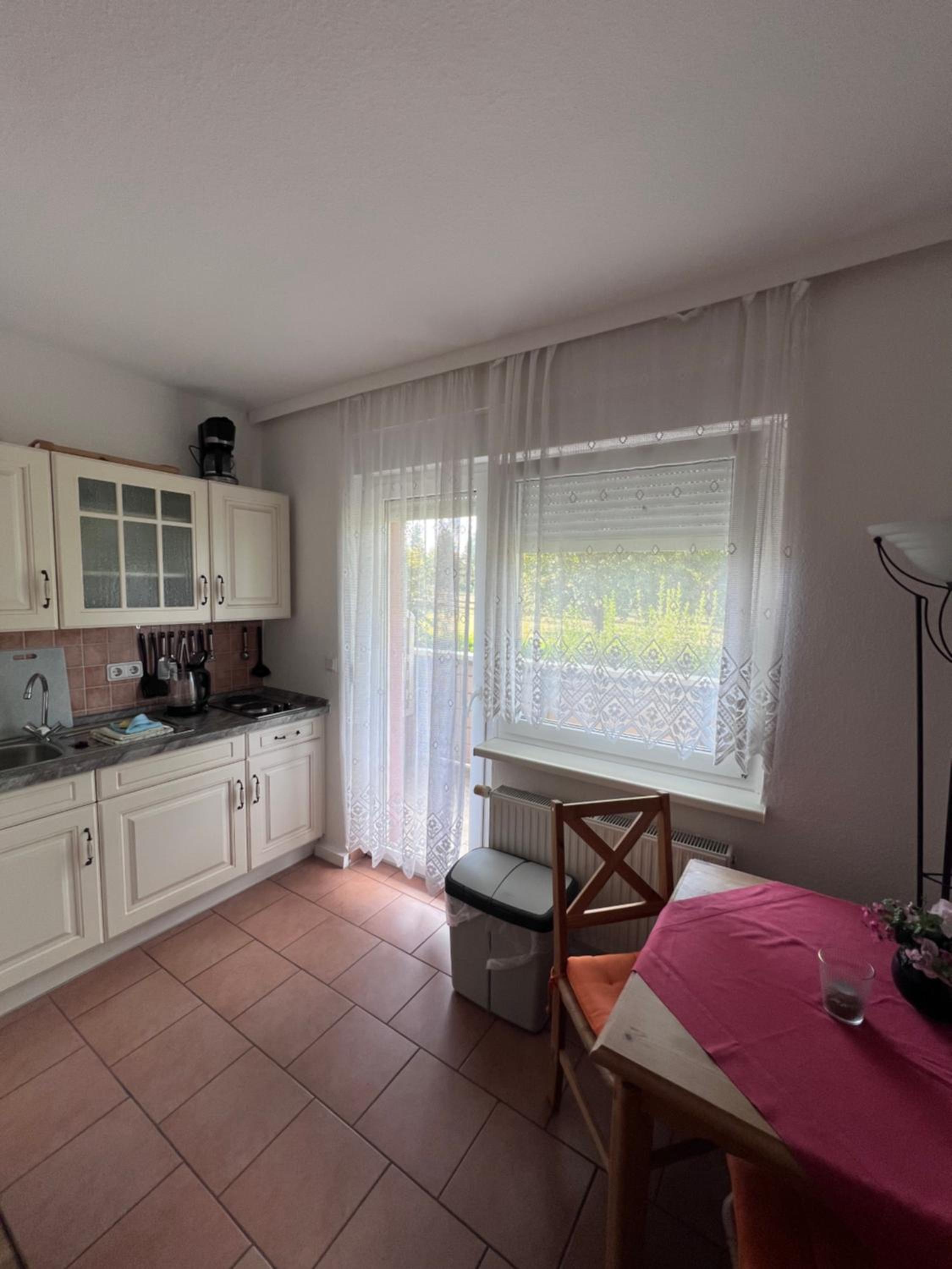 Apartment with Balcony - Photo 2