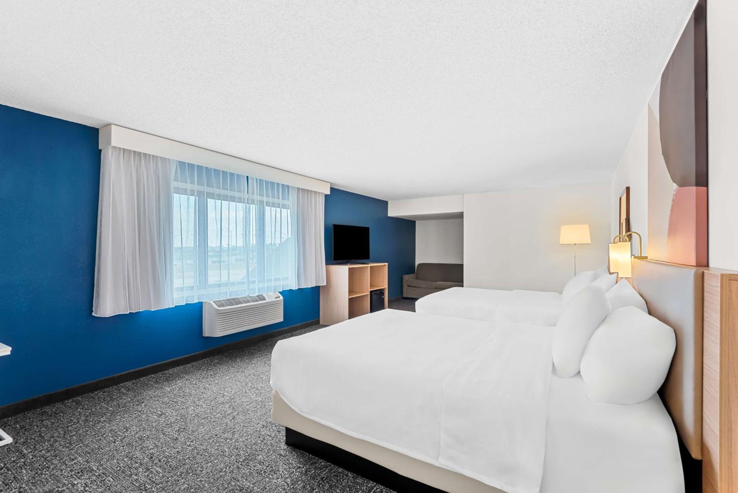 Queen Room with Two Queen Beds and Sofa Bed