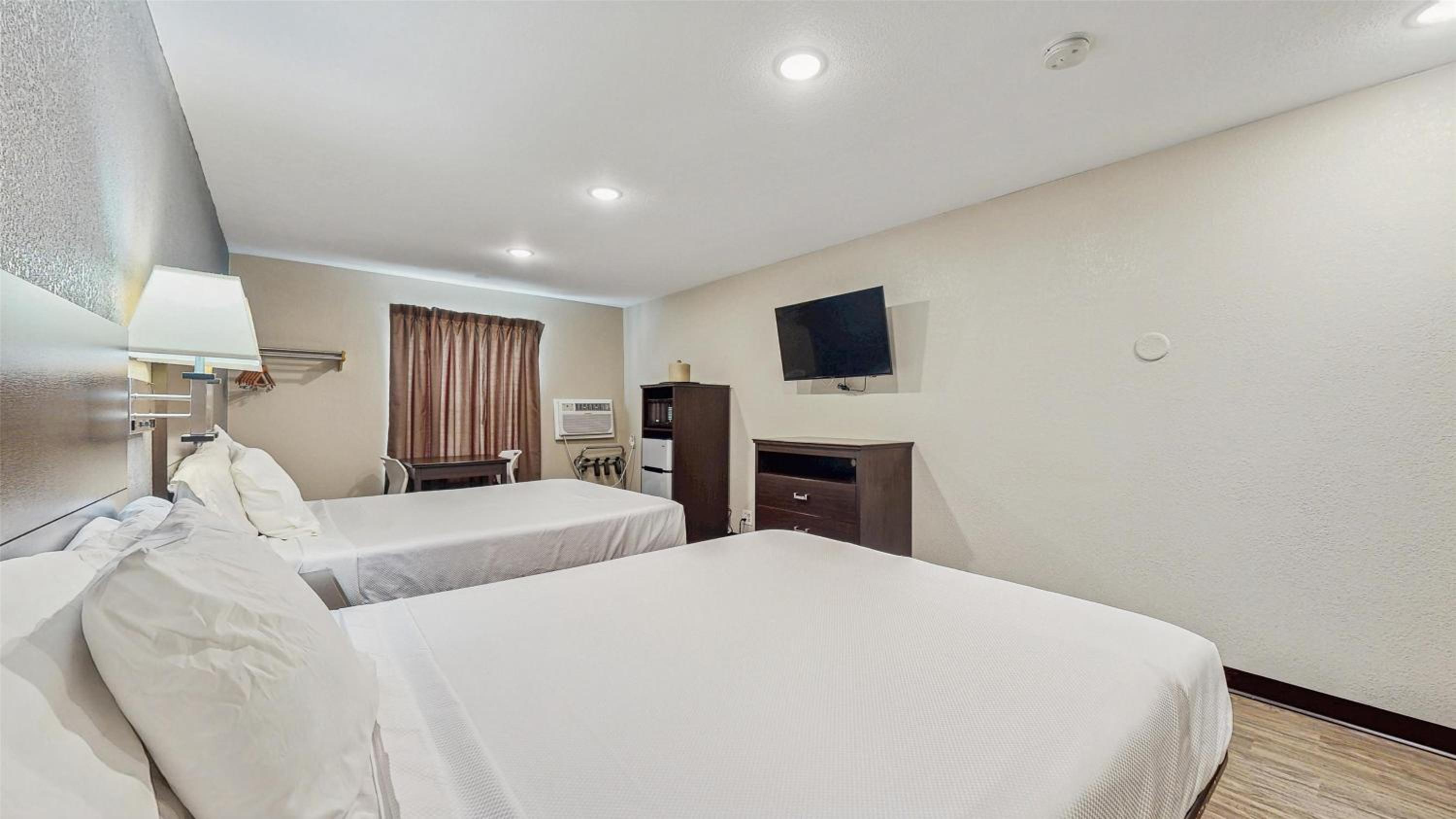 Suite, 2 Queen Beds with Sofa bed, Smoking, Refrigerator & Microwave - Photo 2