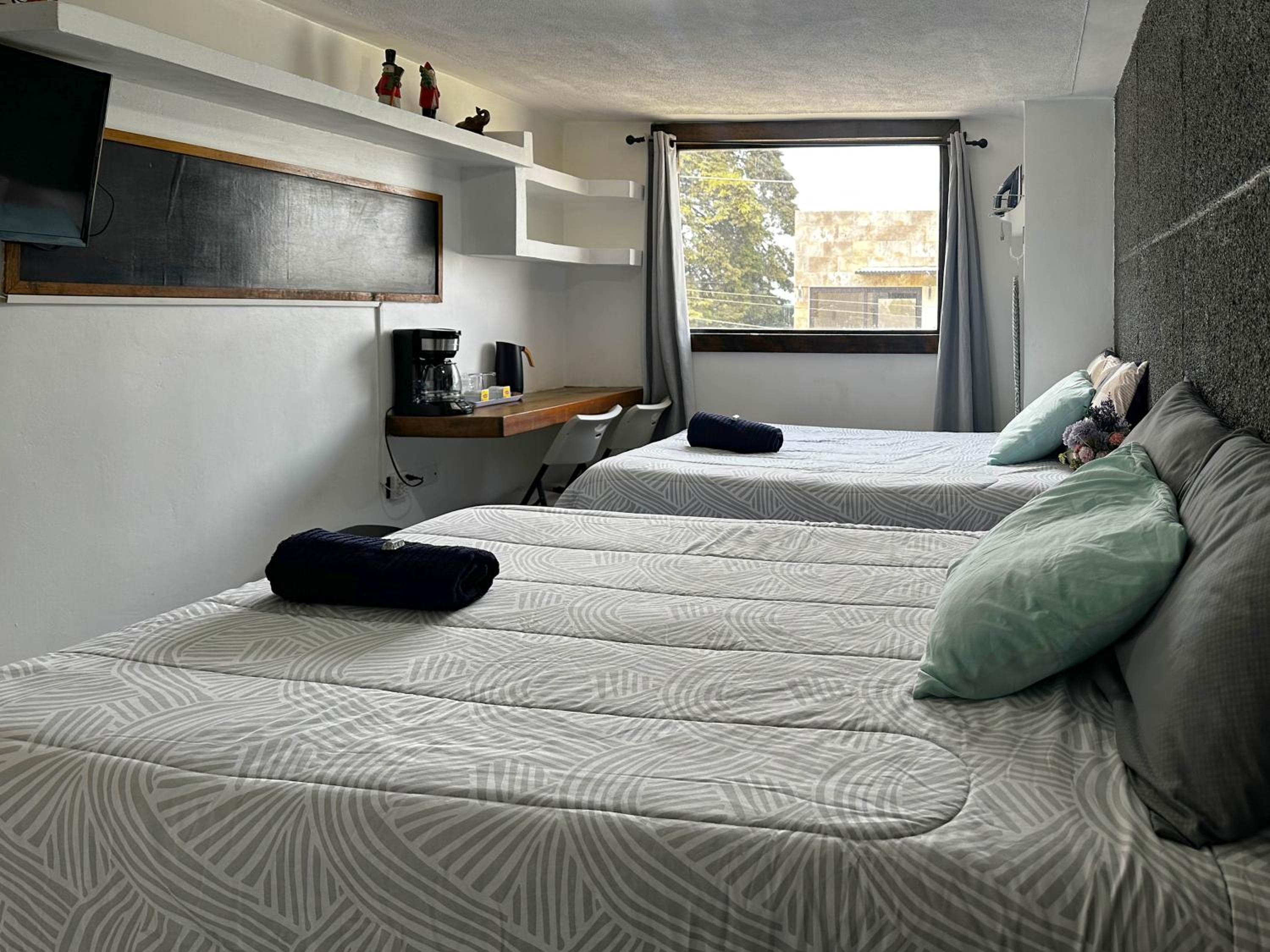 Quadruple Room with Private Bathroom photo 1