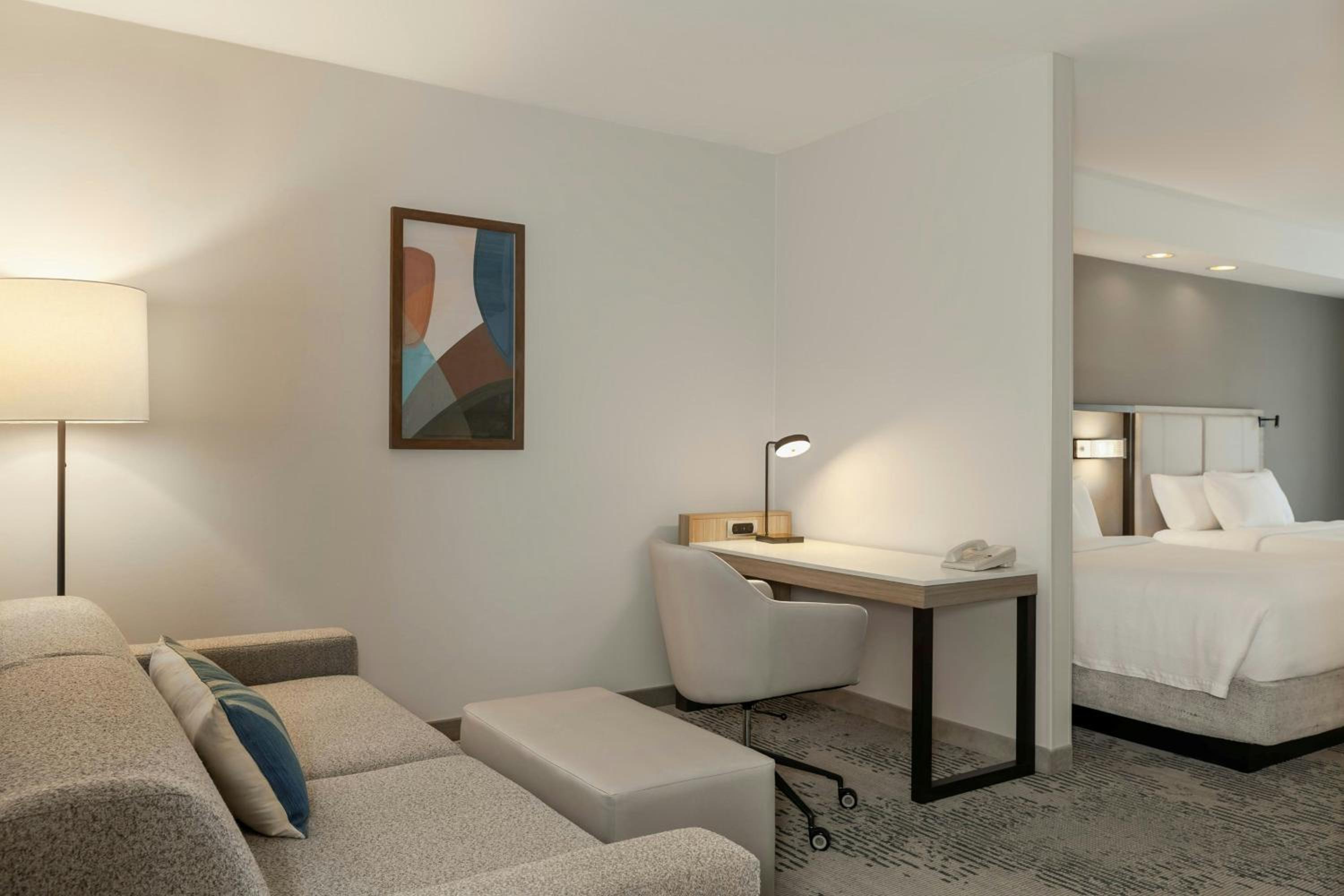 Queen Suite with Two Queen Beds and Trundle Sofa - Photo 2