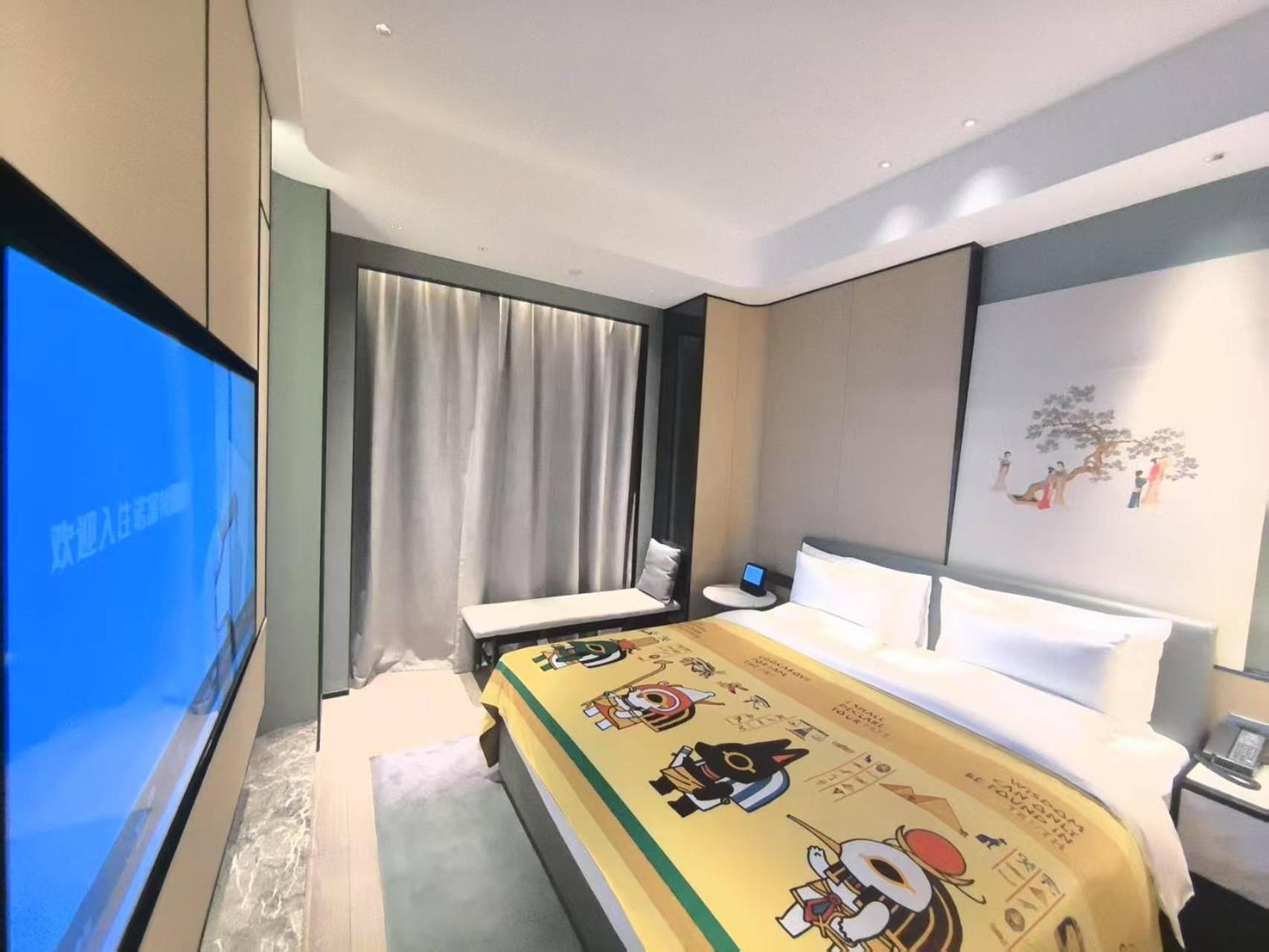 Family Suite with One King Bed and One Single Bed