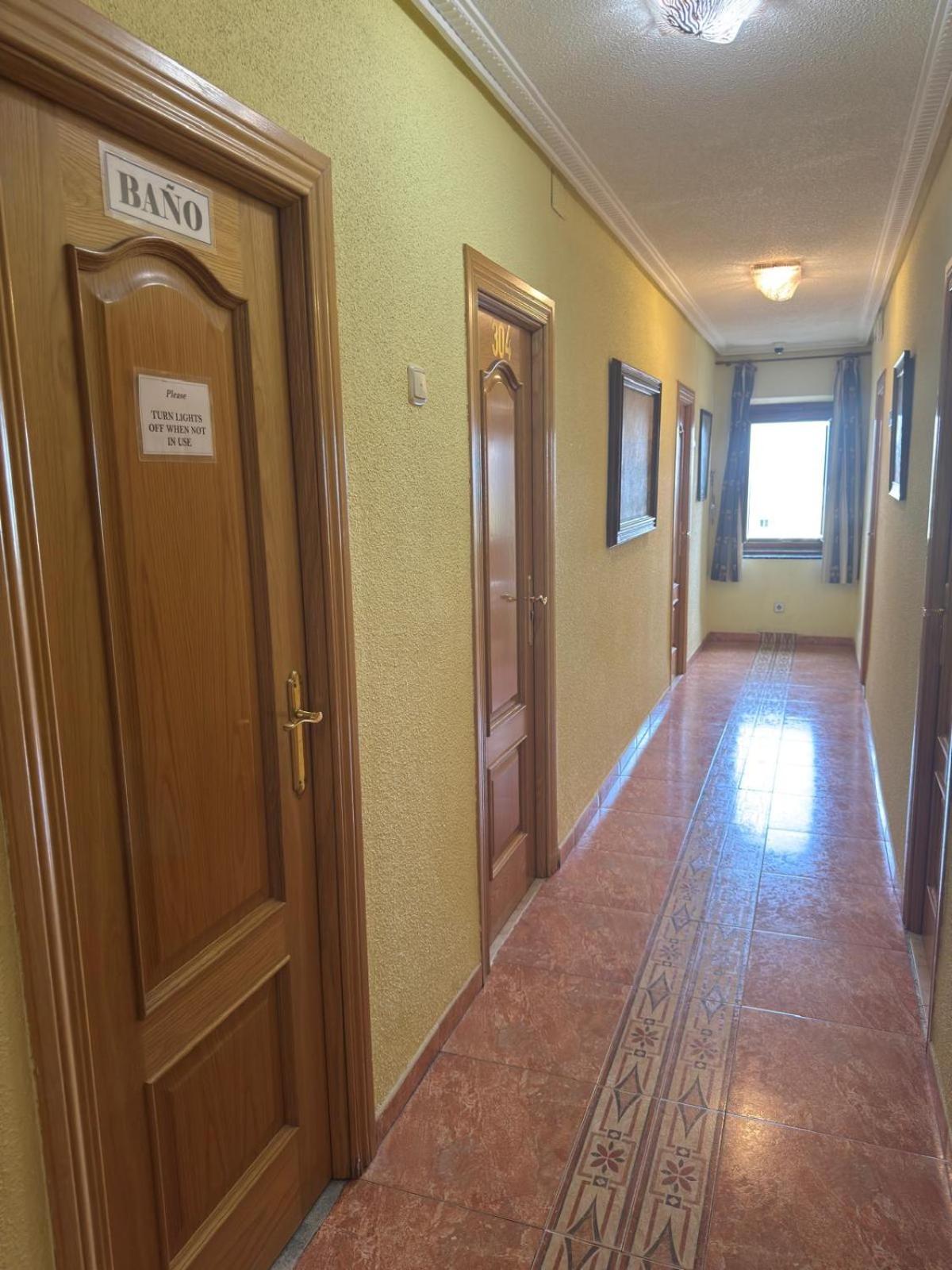 Basic Single Room with Shared Bathroom