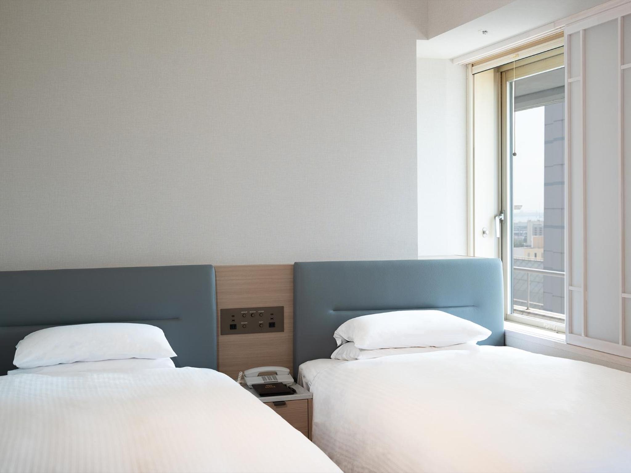 Twin Room - Photo 1