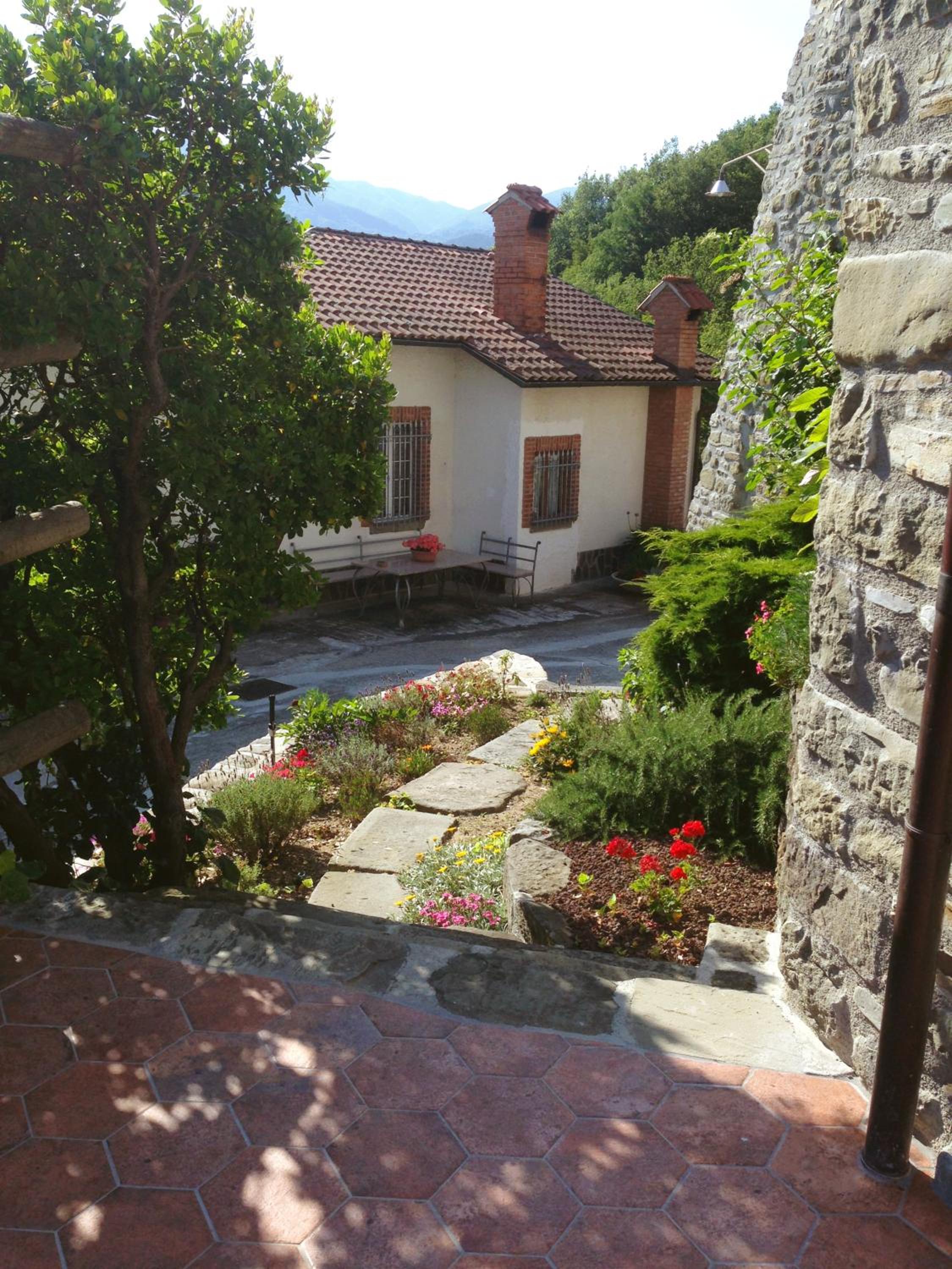 Three-Bedroom House - Photo 26