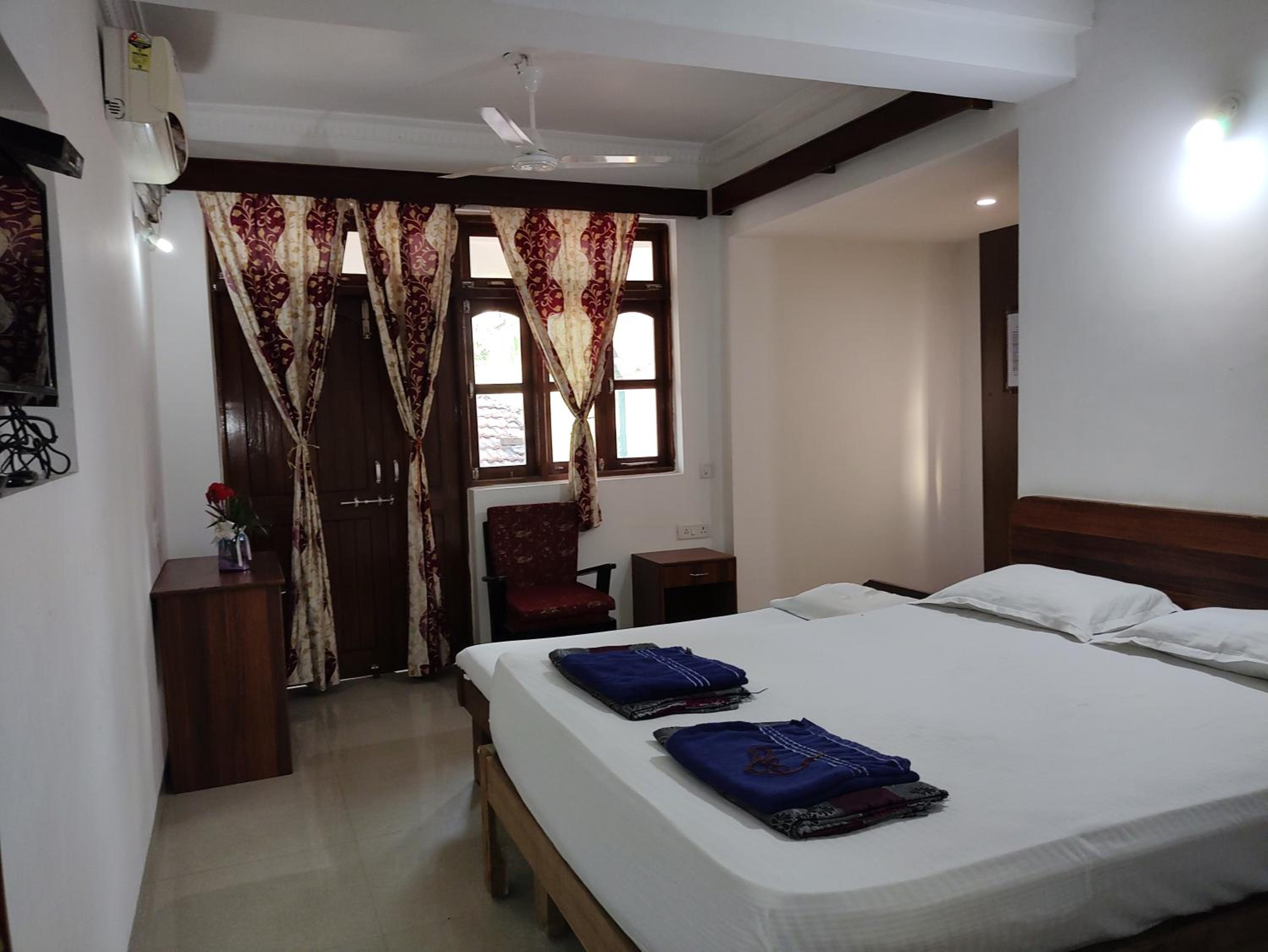 Deluxe Triple Room - Photo 8