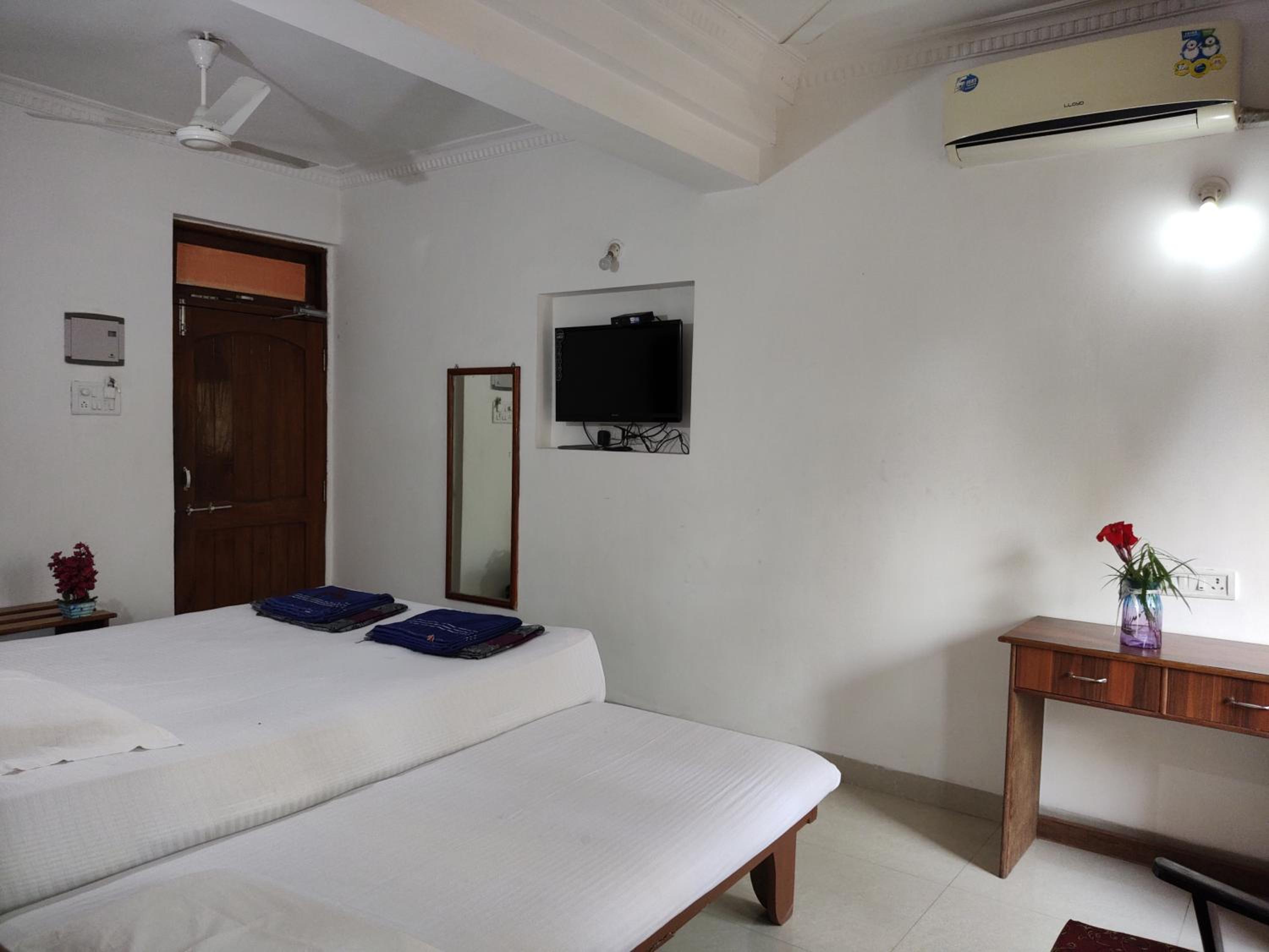 Deluxe Triple Room - Photo 9