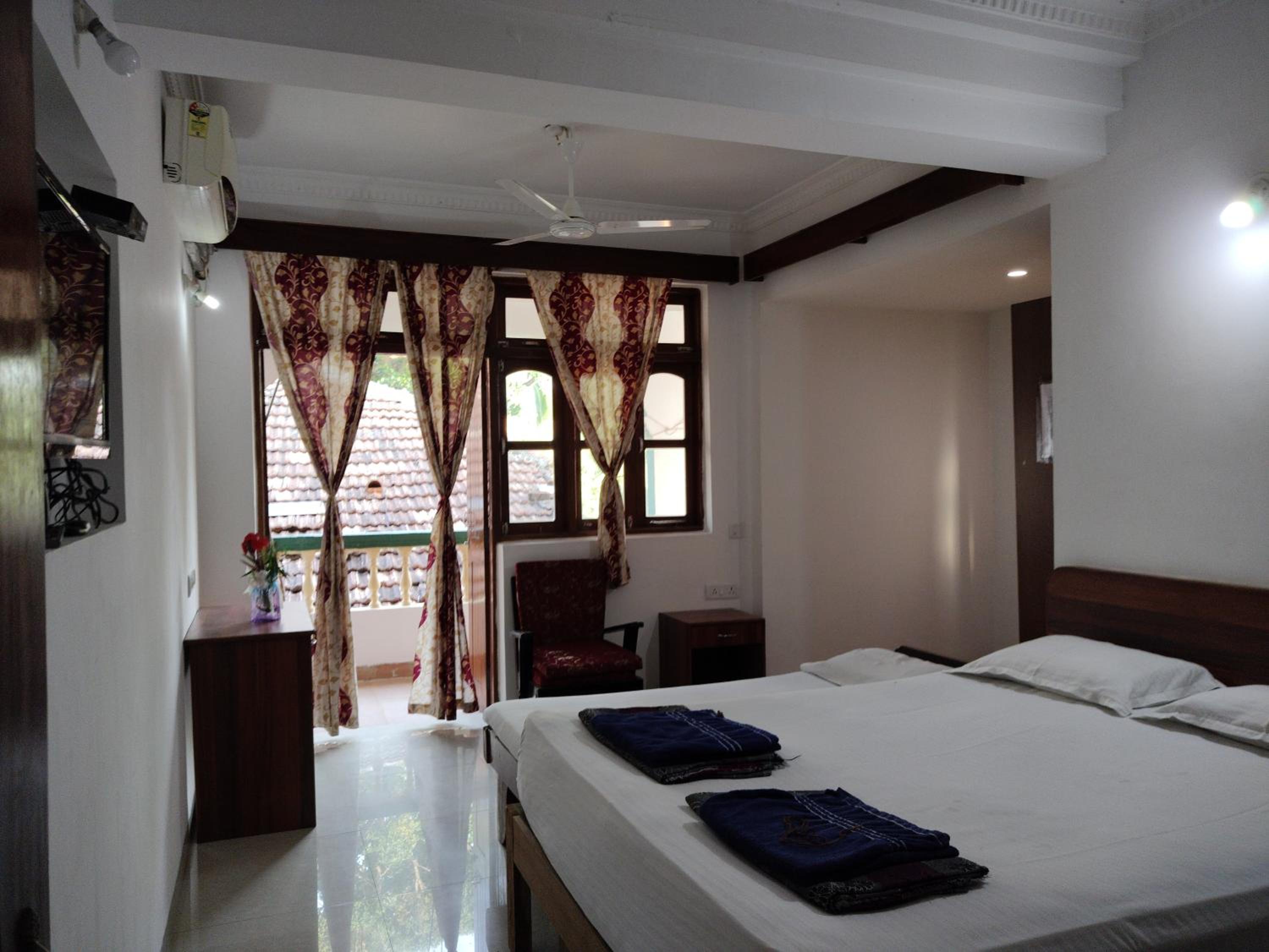 Deluxe Triple Room - Photo 15
