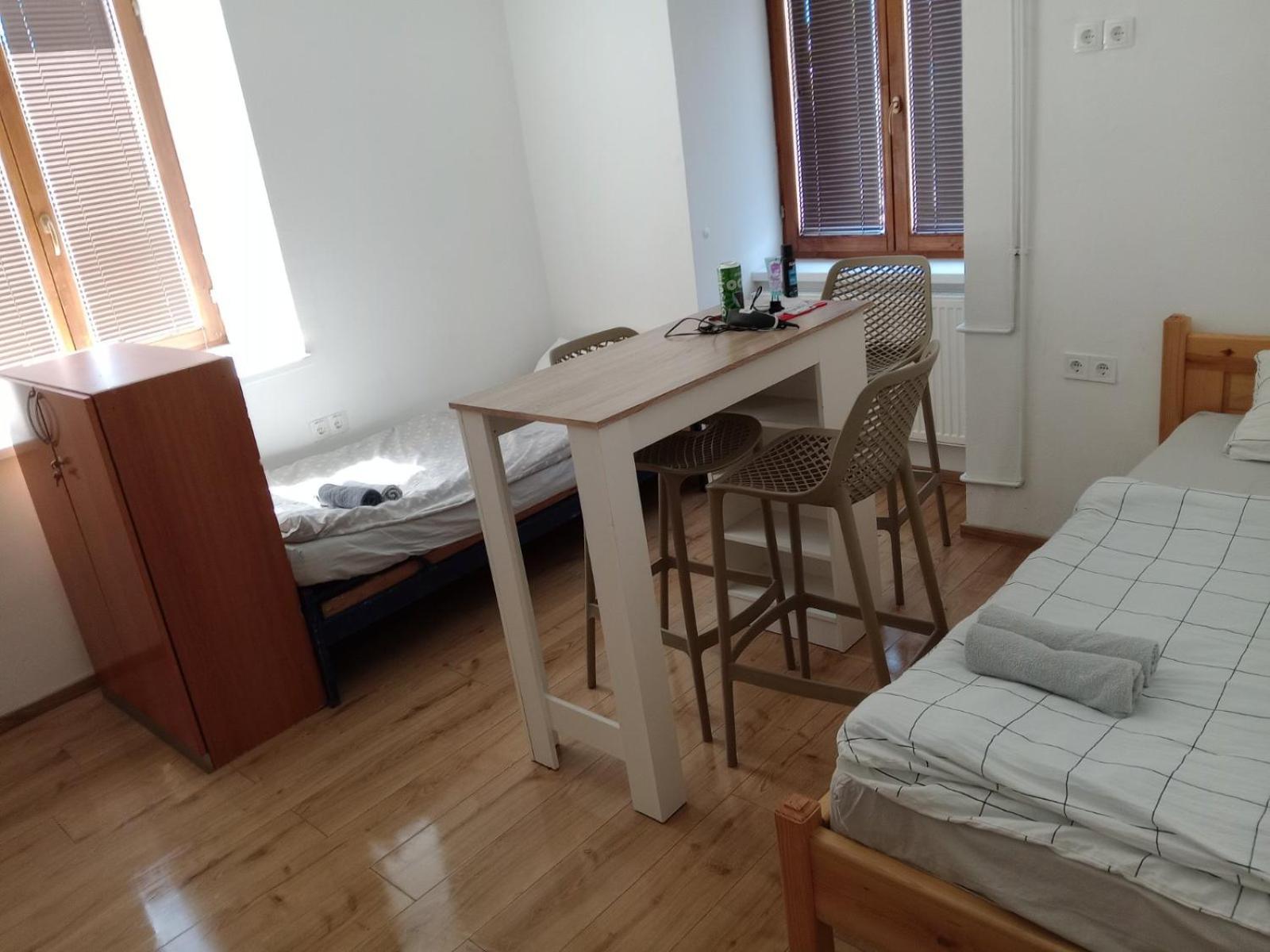 Single Bed in Dormitory Room