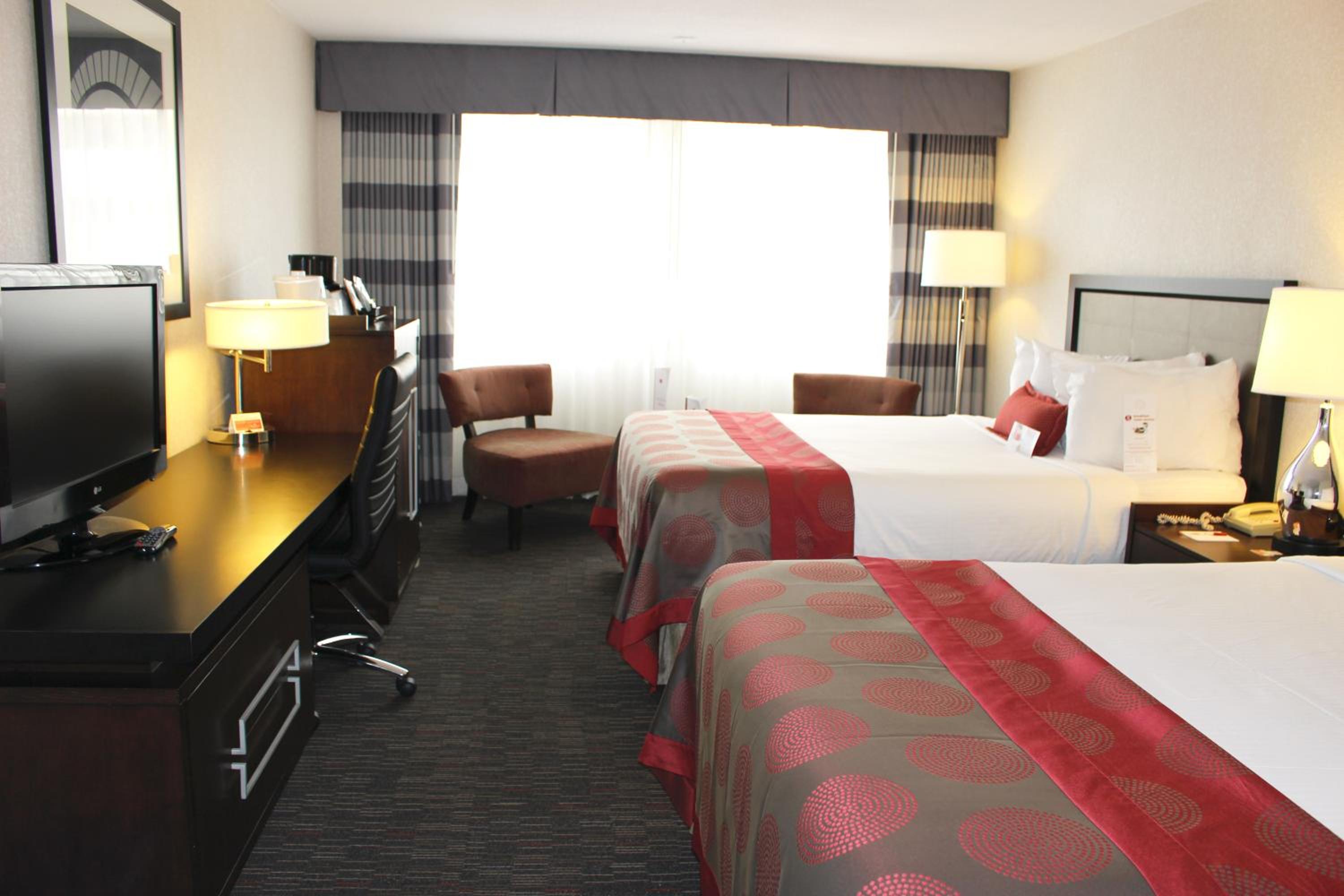 Superior Queen Room with Two Queen Beds - Photo 1
