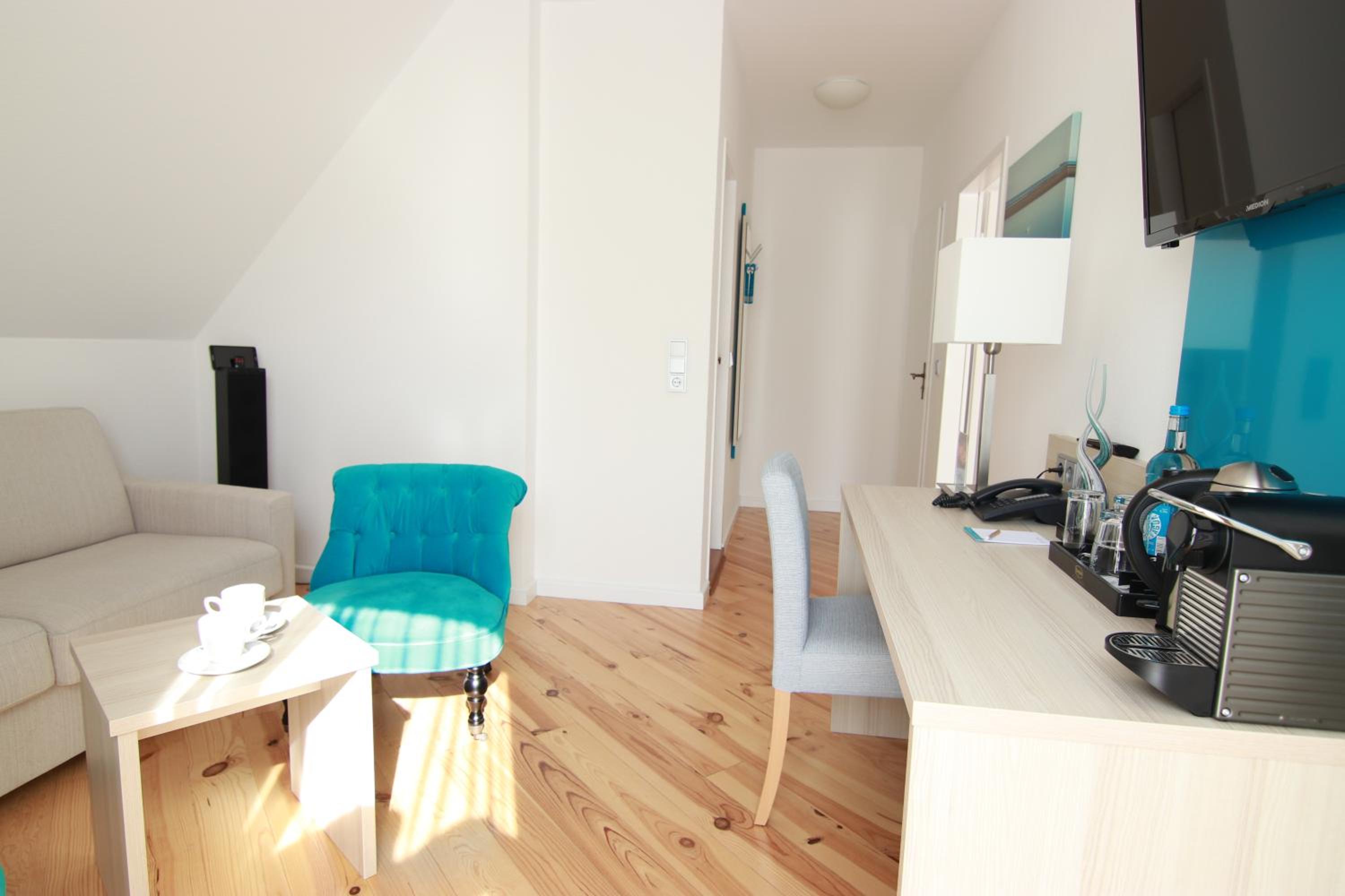 Quadruple Room with Balcony photo 3