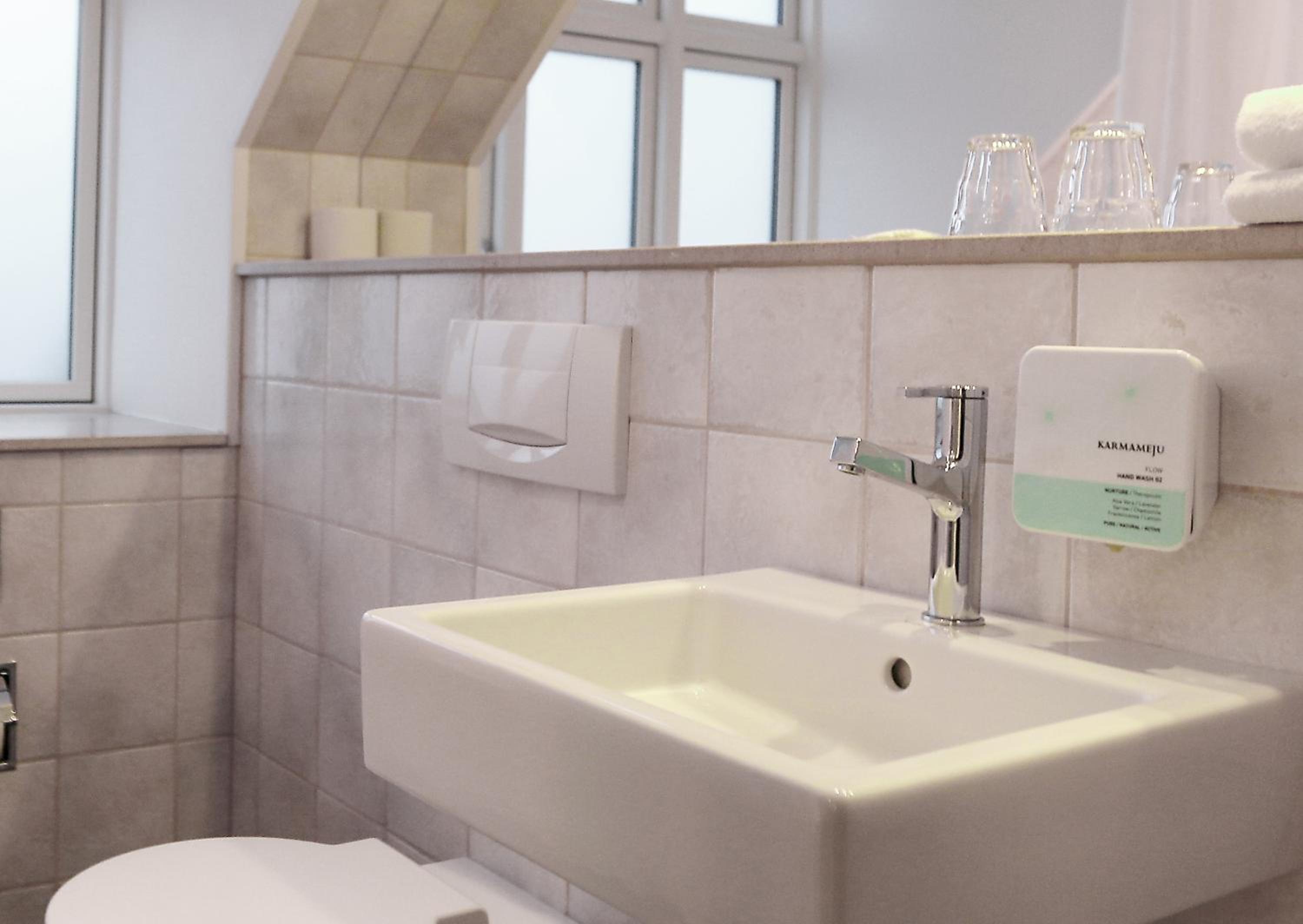Relax in your modern, serene bathroom oasis.