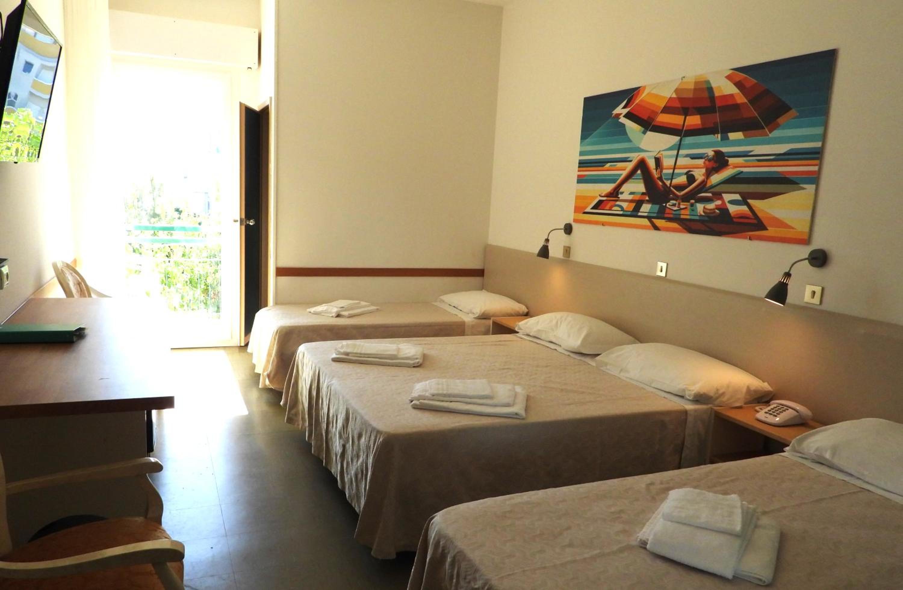 Quadruple Room with Balcony and Side Sea View photo 1
