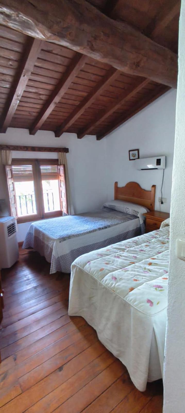 Habitación Doble con Dos Camas Dobles